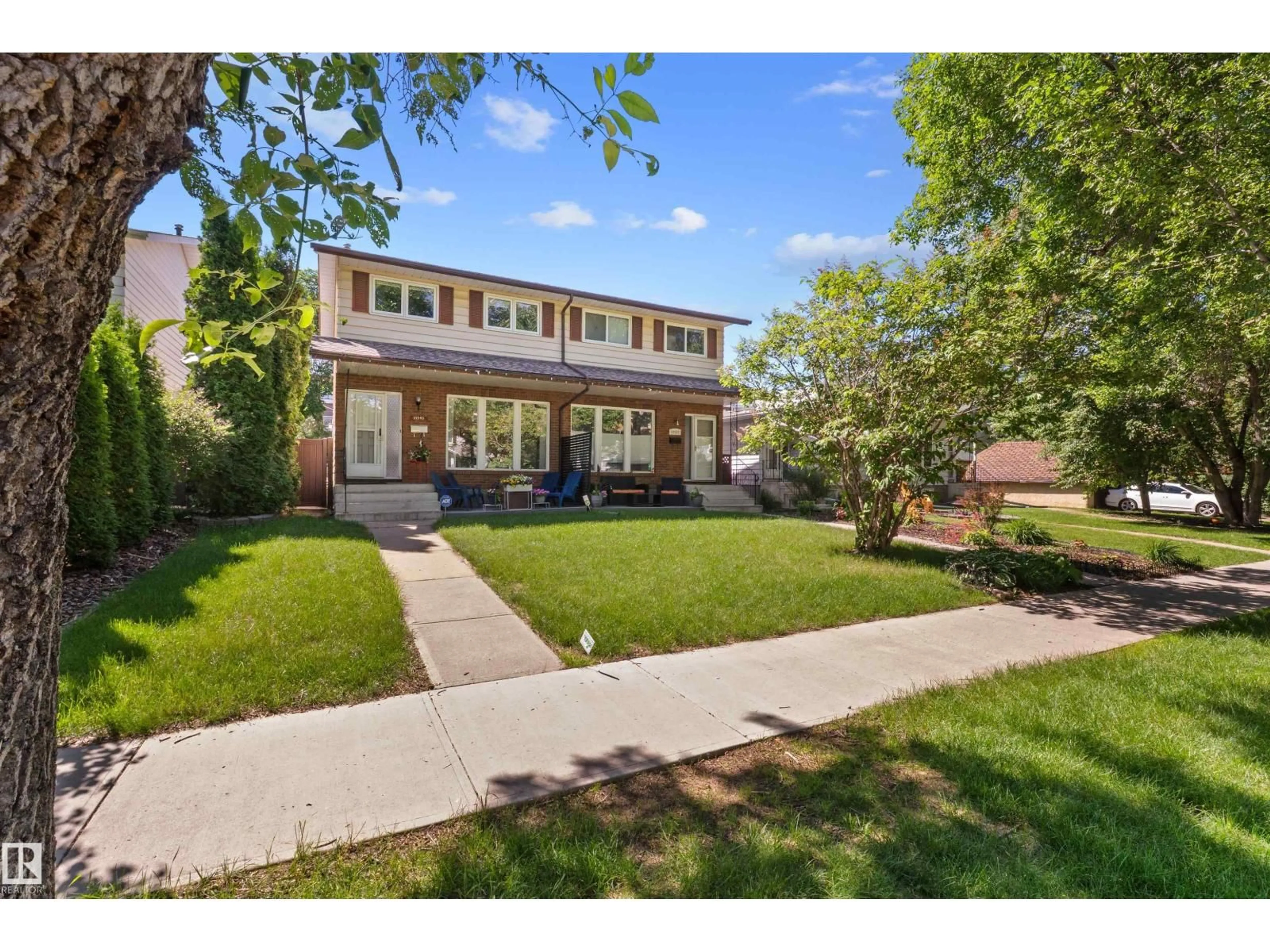 Home with brick exterior material, street for 10940 123 ST, Edmonton Alberta T5M0C9
