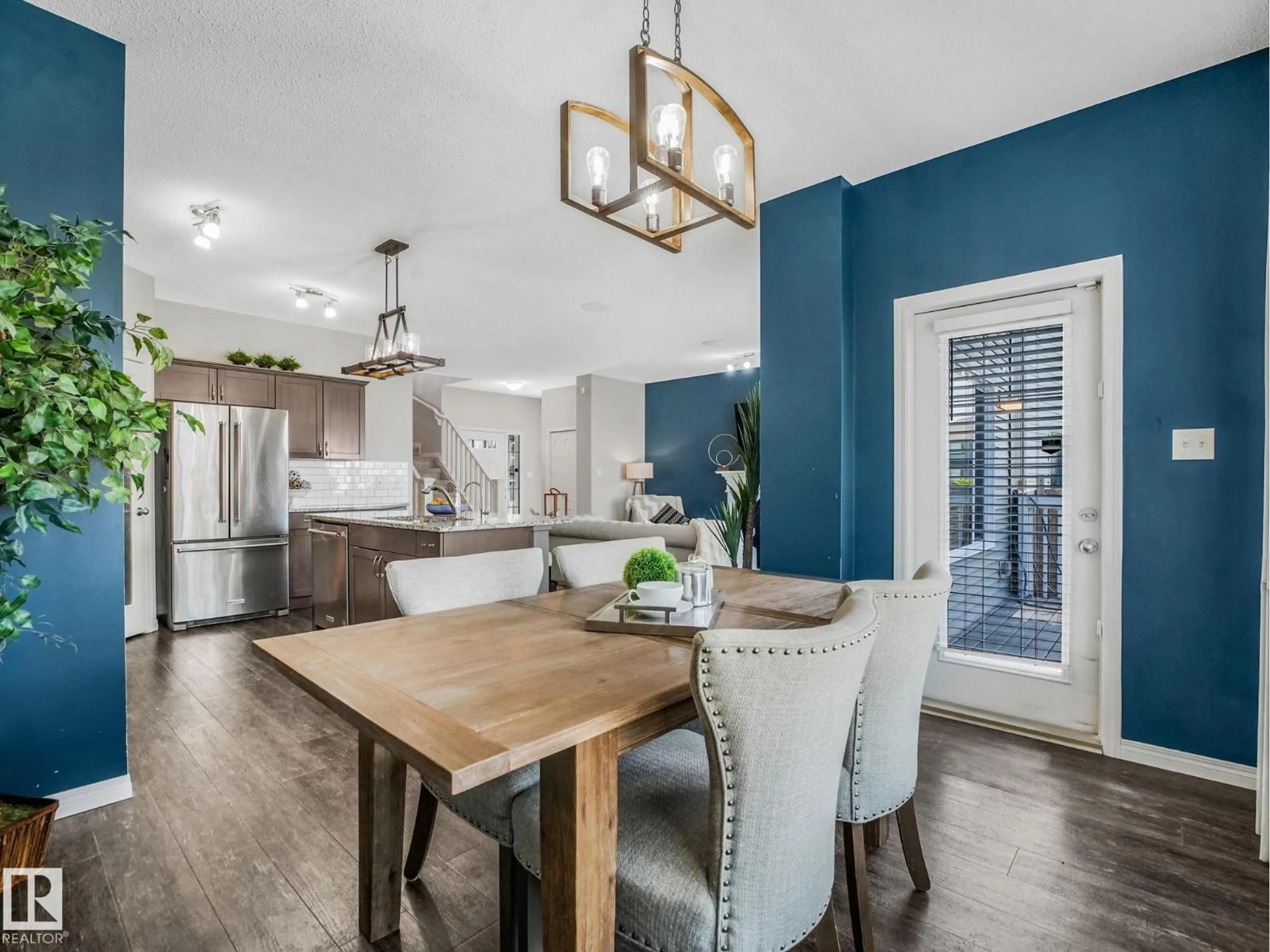 Open concept kitchen, wood/laminate floor for 14 SUMAC LN, Sherwood Park Alberta T8H0Z5
