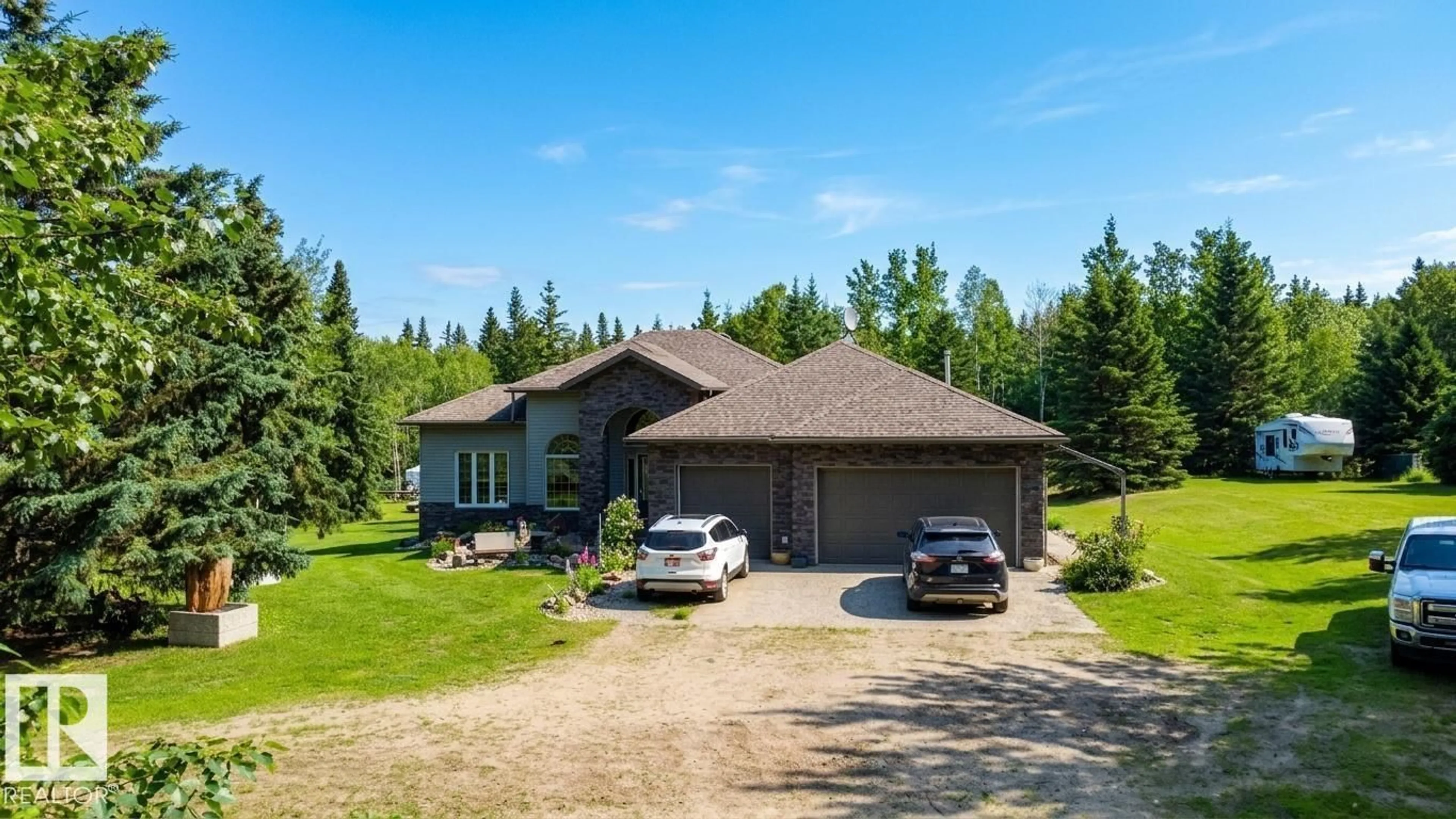 A pic from outside/outdoor area/front of a property/back of a property/a pic from drone, unknown for 9 PINEBROOK ESTATES, Rural Thorhild County Alberta T0G2J0
