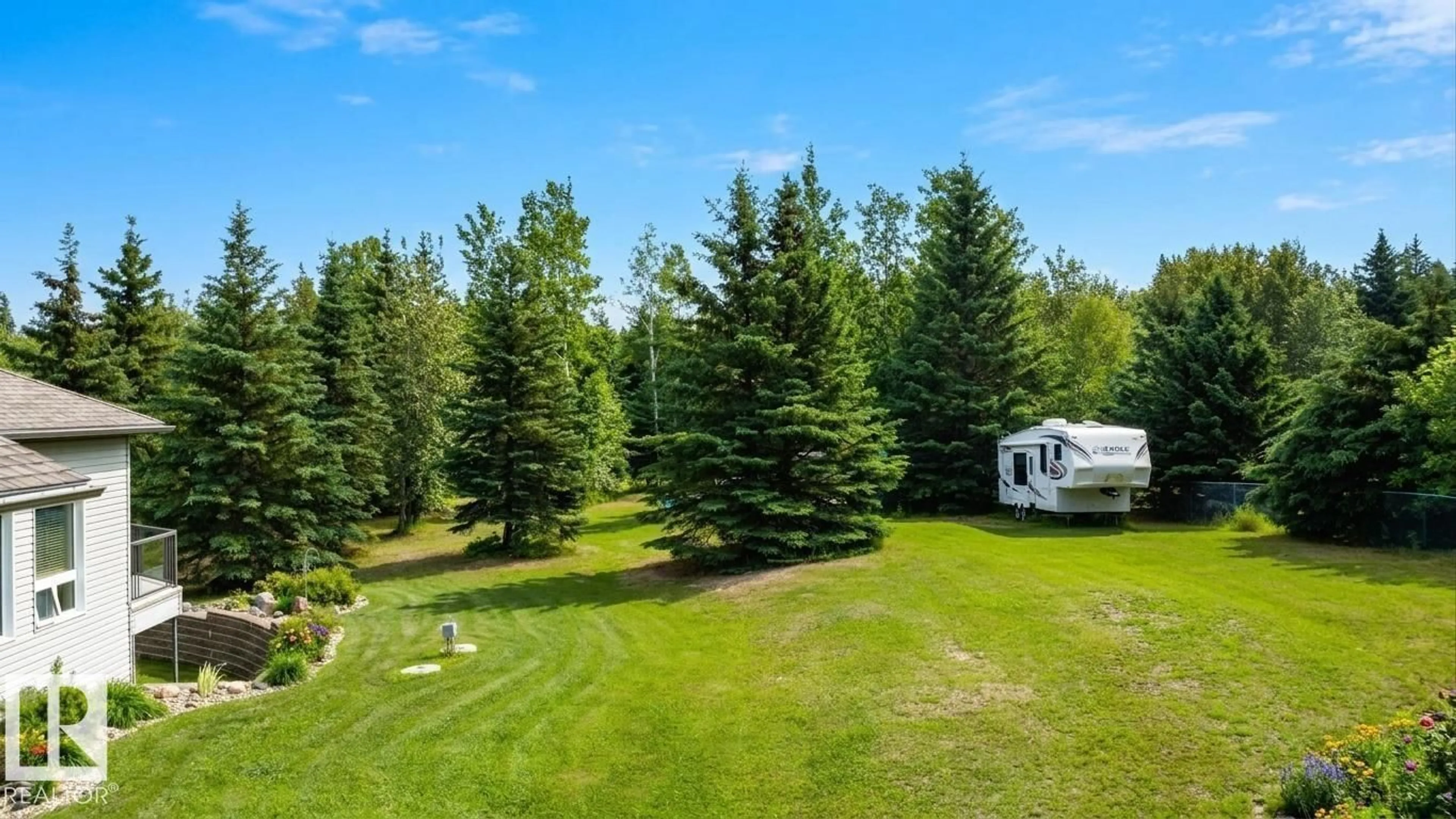 A pic from outside/outdoor area/front of a property/back of a property/a pic from drone, forest/trees view for 9 PINEBROOK ESTATES, Rural Thorhild County Alberta T0G2J0
