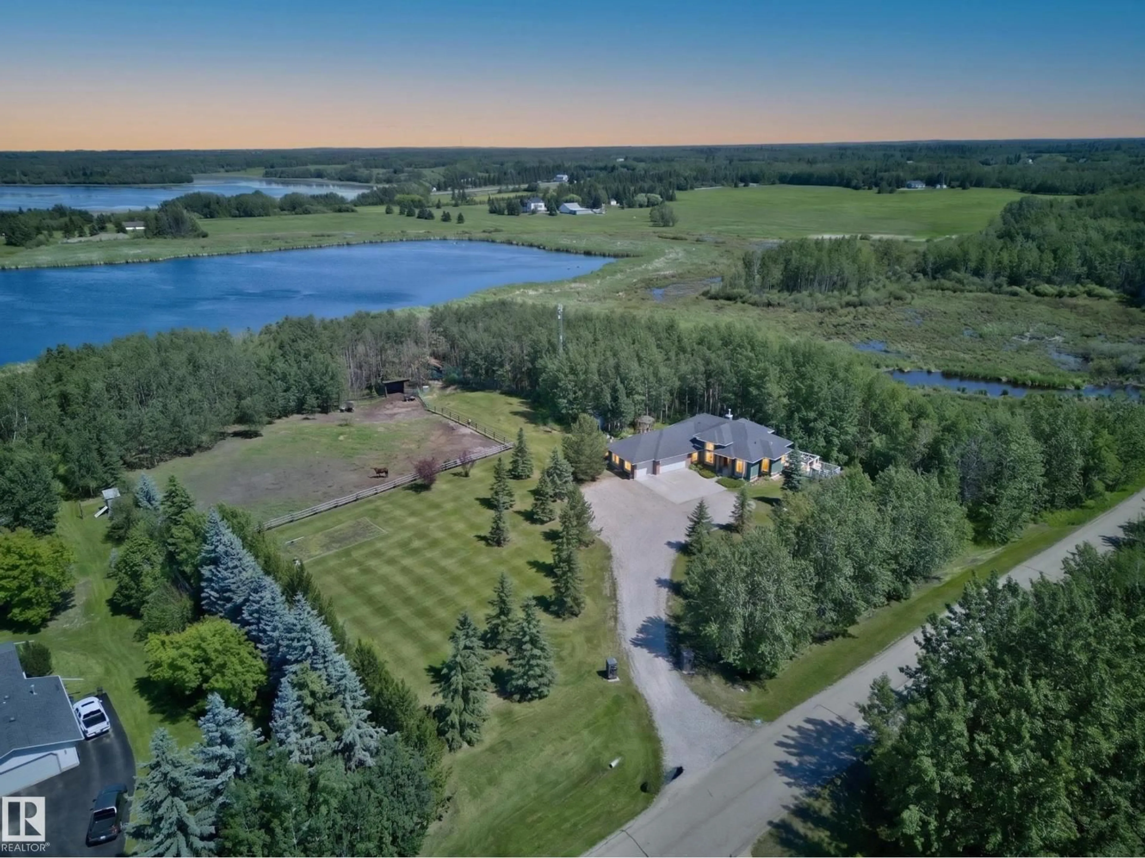 A pic from outside/outdoor area/front of a property/back of a property/a pic from drone, water/lake/river/ocean view for 229 RGE ROAD 224, Rural Strathcona County Alberta T8C1B6