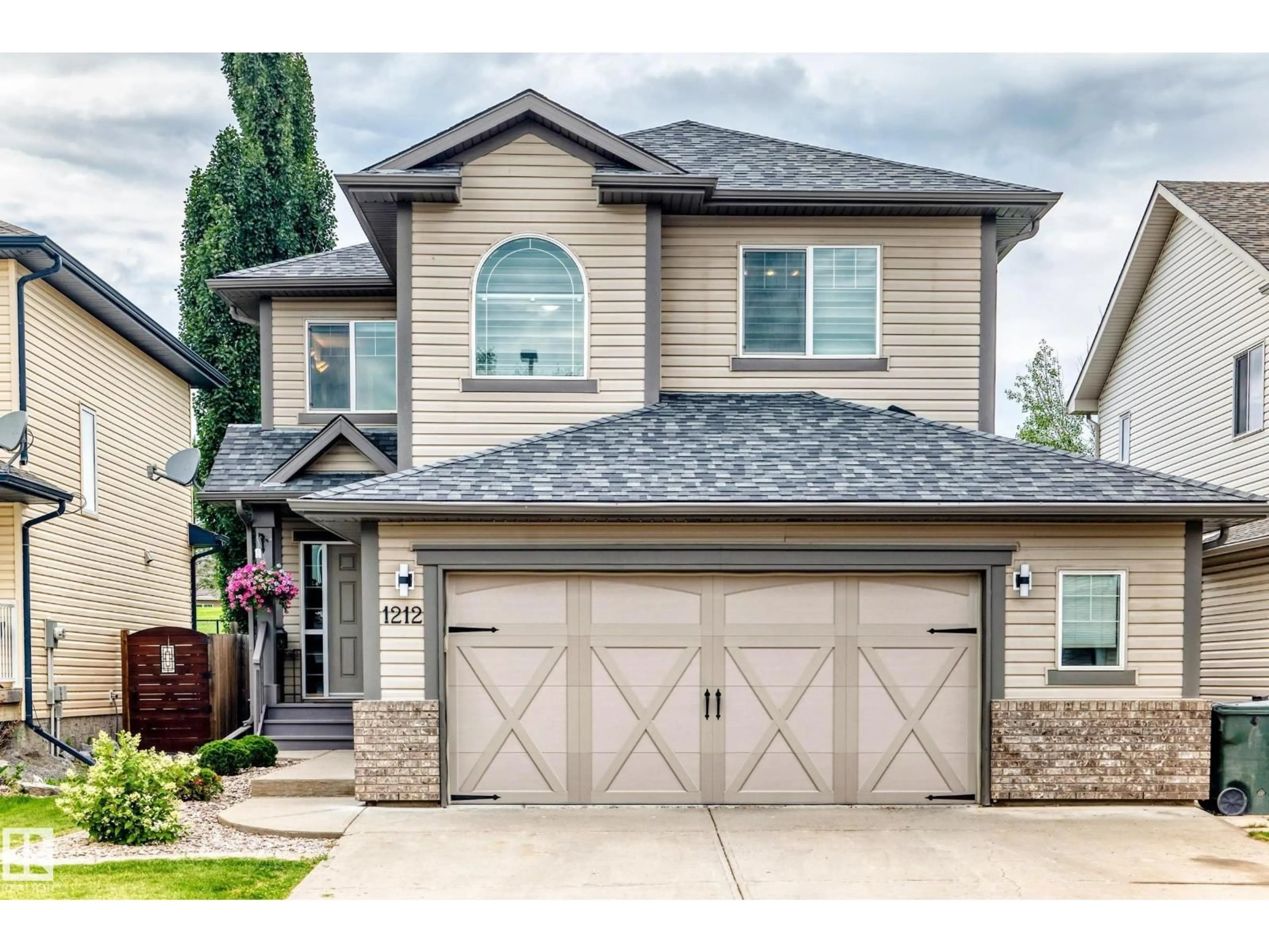 Home with vinyl exterior material, street for 1212 WESTERRA CR, Stony Plain Alberta T7Z0B2