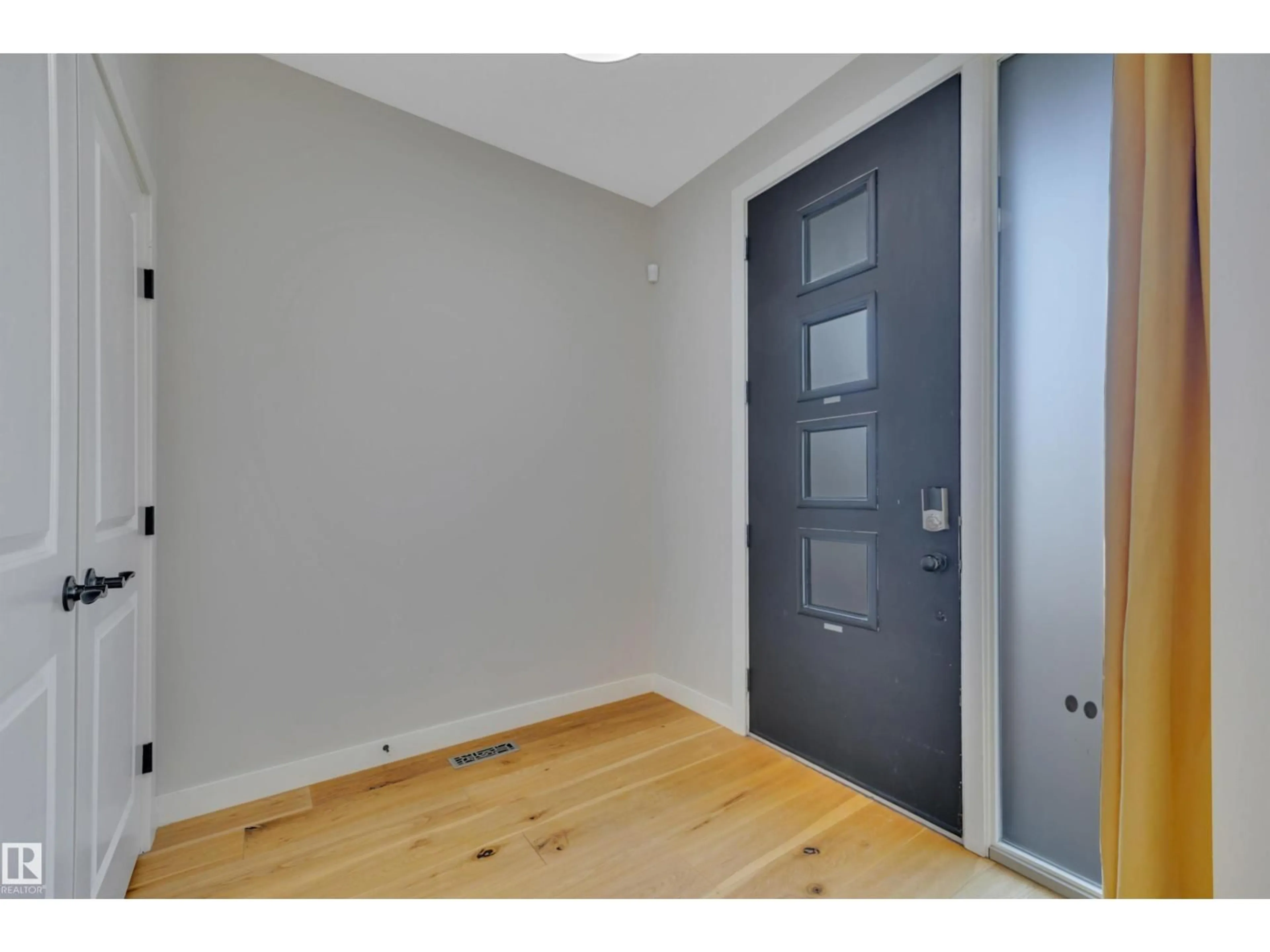 Indoor entryway for 10919 96 ST, Edmonton Alberta T5H2K4