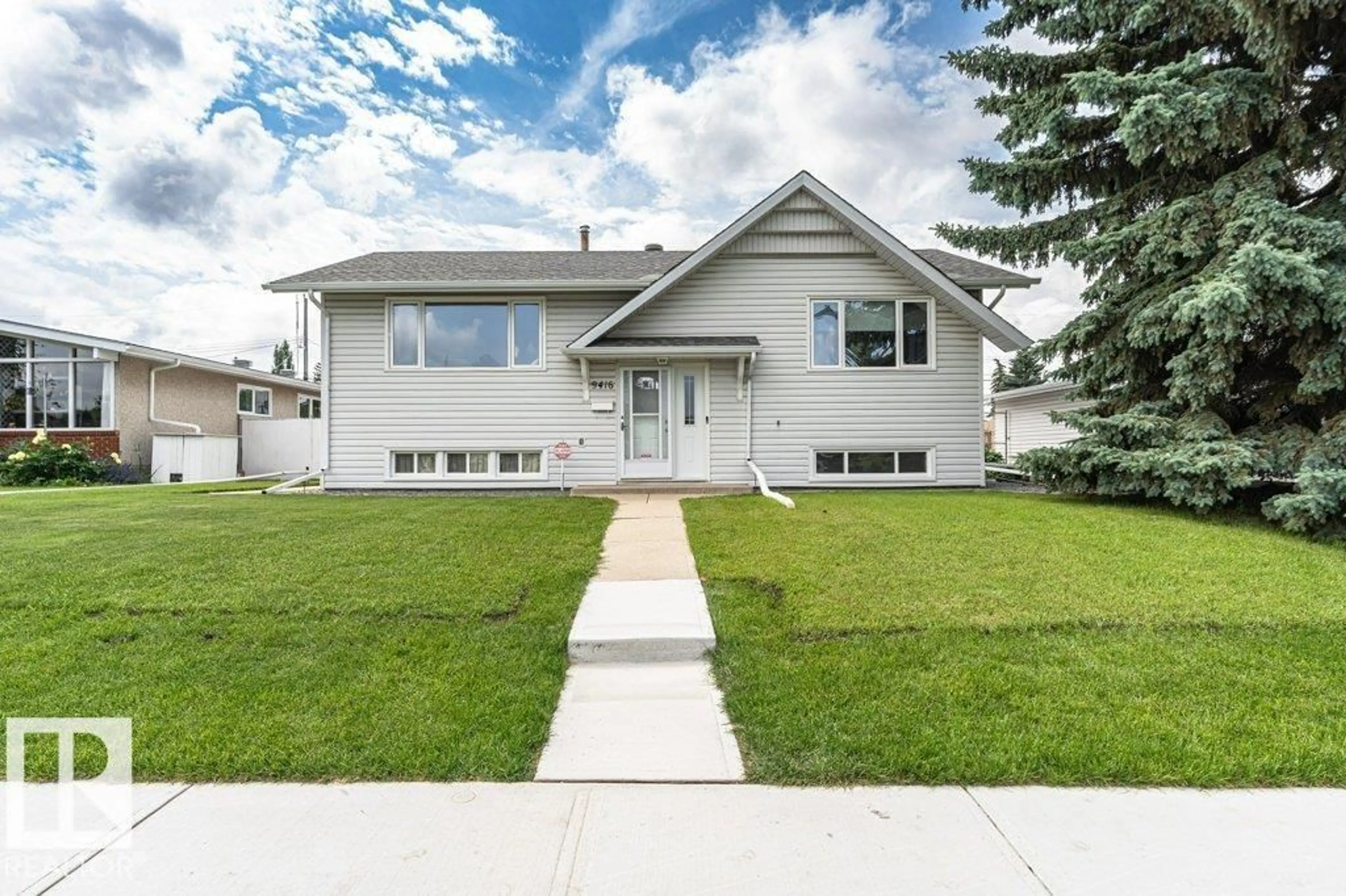 Home with vinyl exterior material, street for NW - 9416 68A ST, Edmonton Alberta T6B1T8