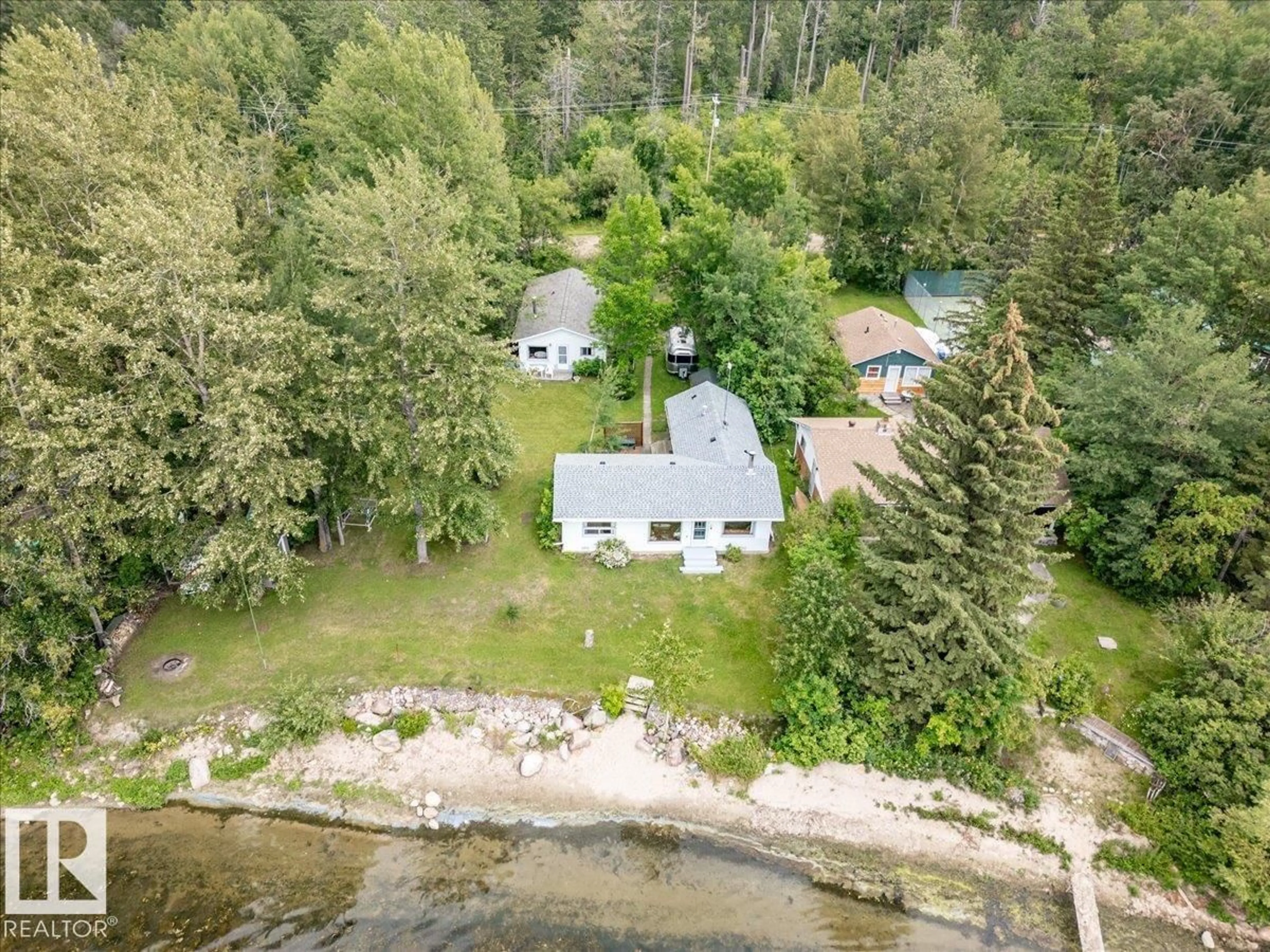 A pic from outside/outdoor area/front of a property/back of a property/a pic from drone, water/lake/river/ocean view for 59 BEACH AVE, Rural Leduc County Alberta T0C2C0