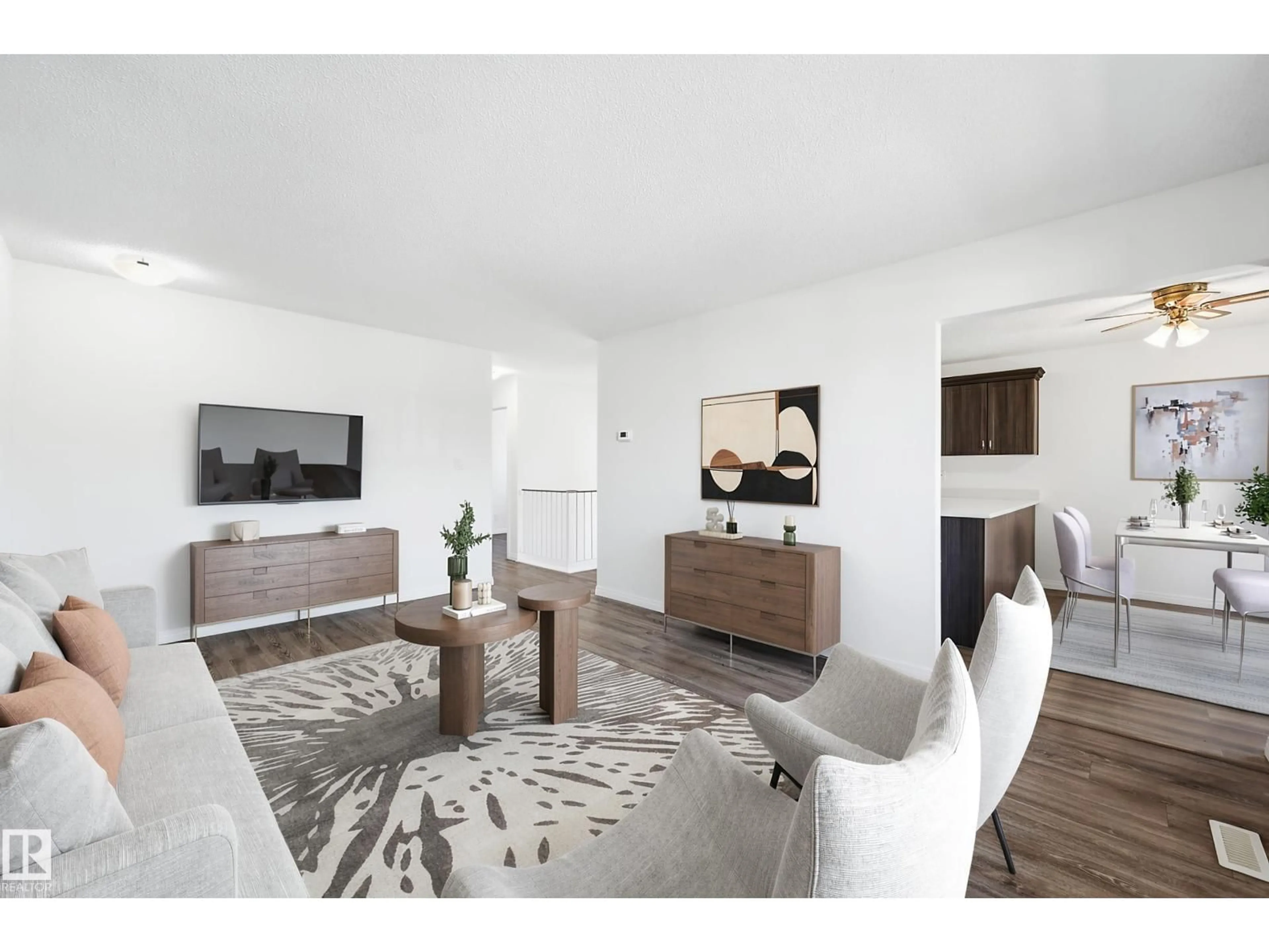 Living room with furniture, wood/laminate floor for 3413 135 AV, Edmonton Alberta T5A2V6