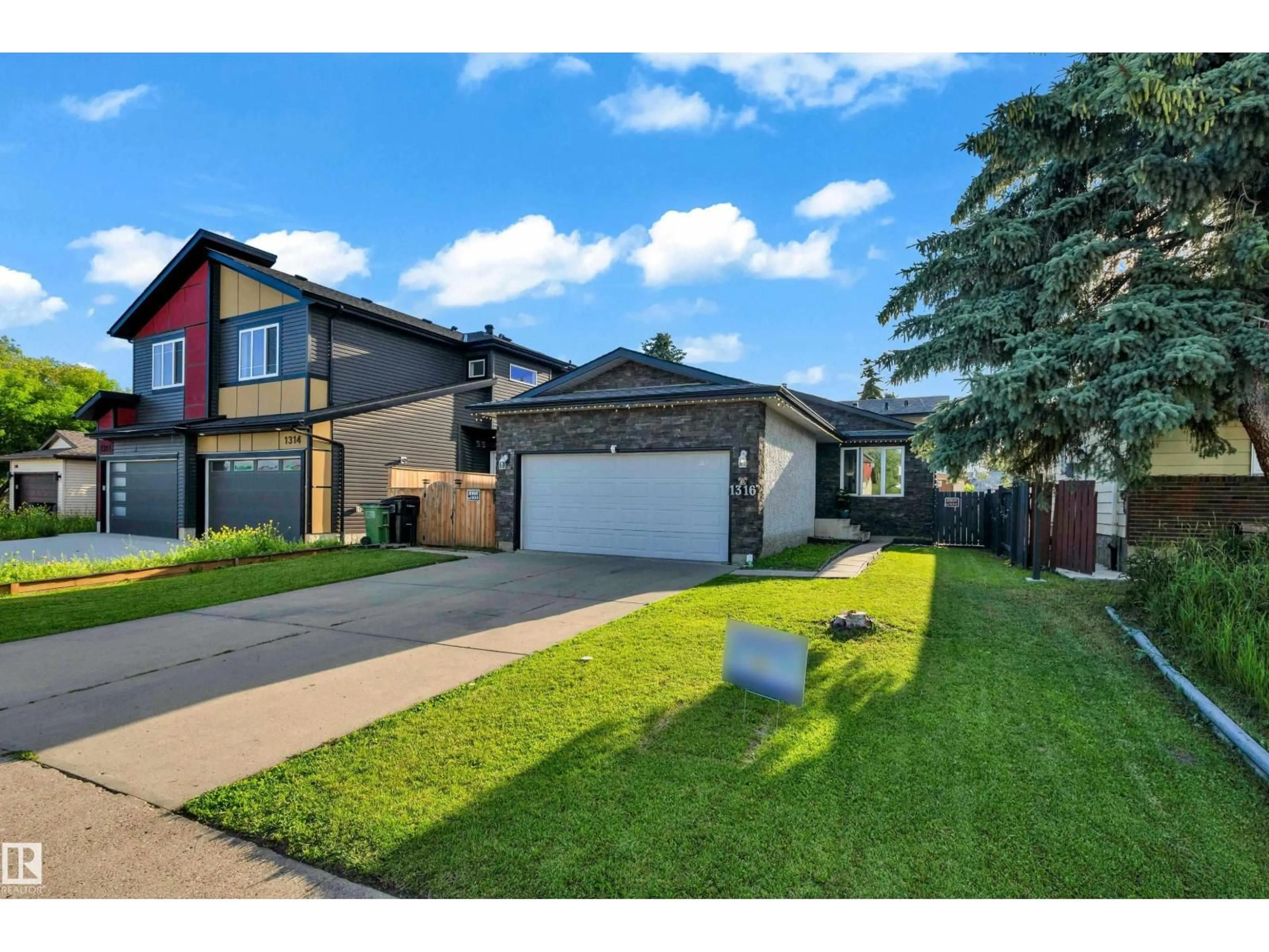 Home with brick exterior material, street for NW - 1316 35 ST, Edmonton Alberta T6L3E8
