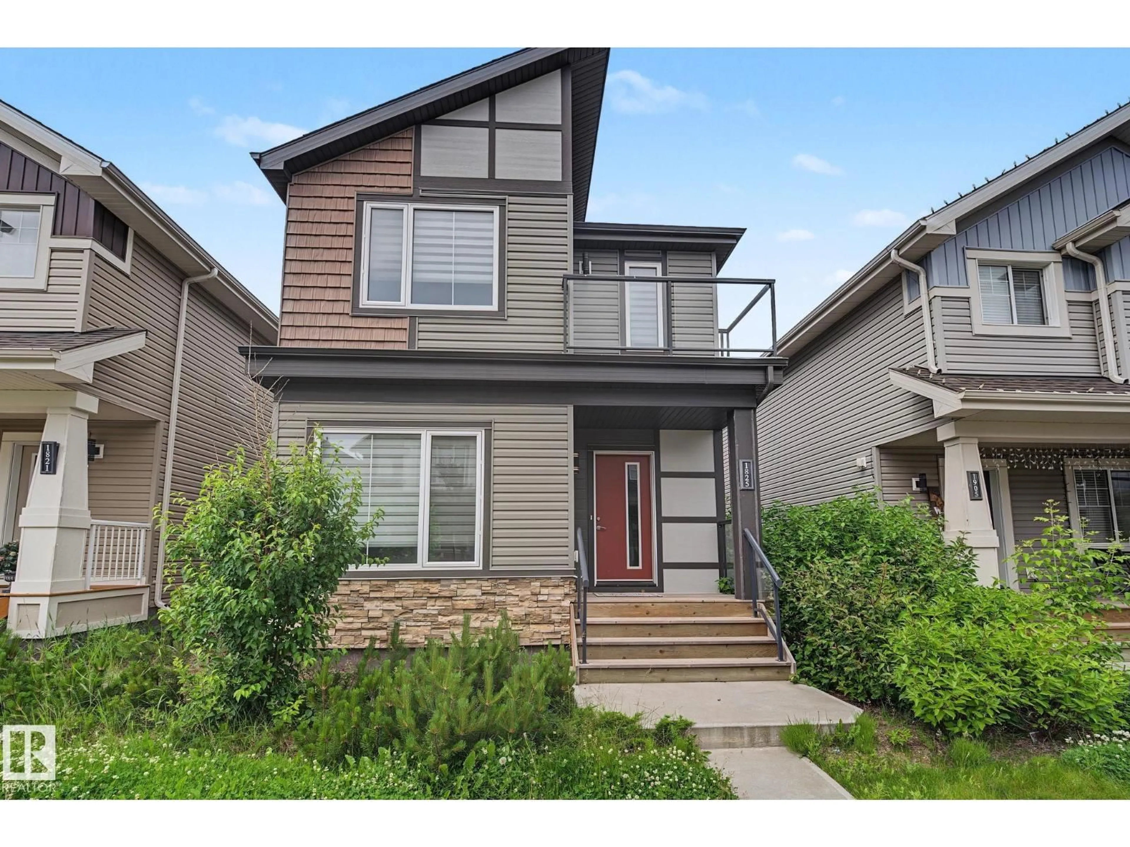 Home with vinyl exterior material, street for 1825 25A ST, Edmonton Alberta T6T2H7