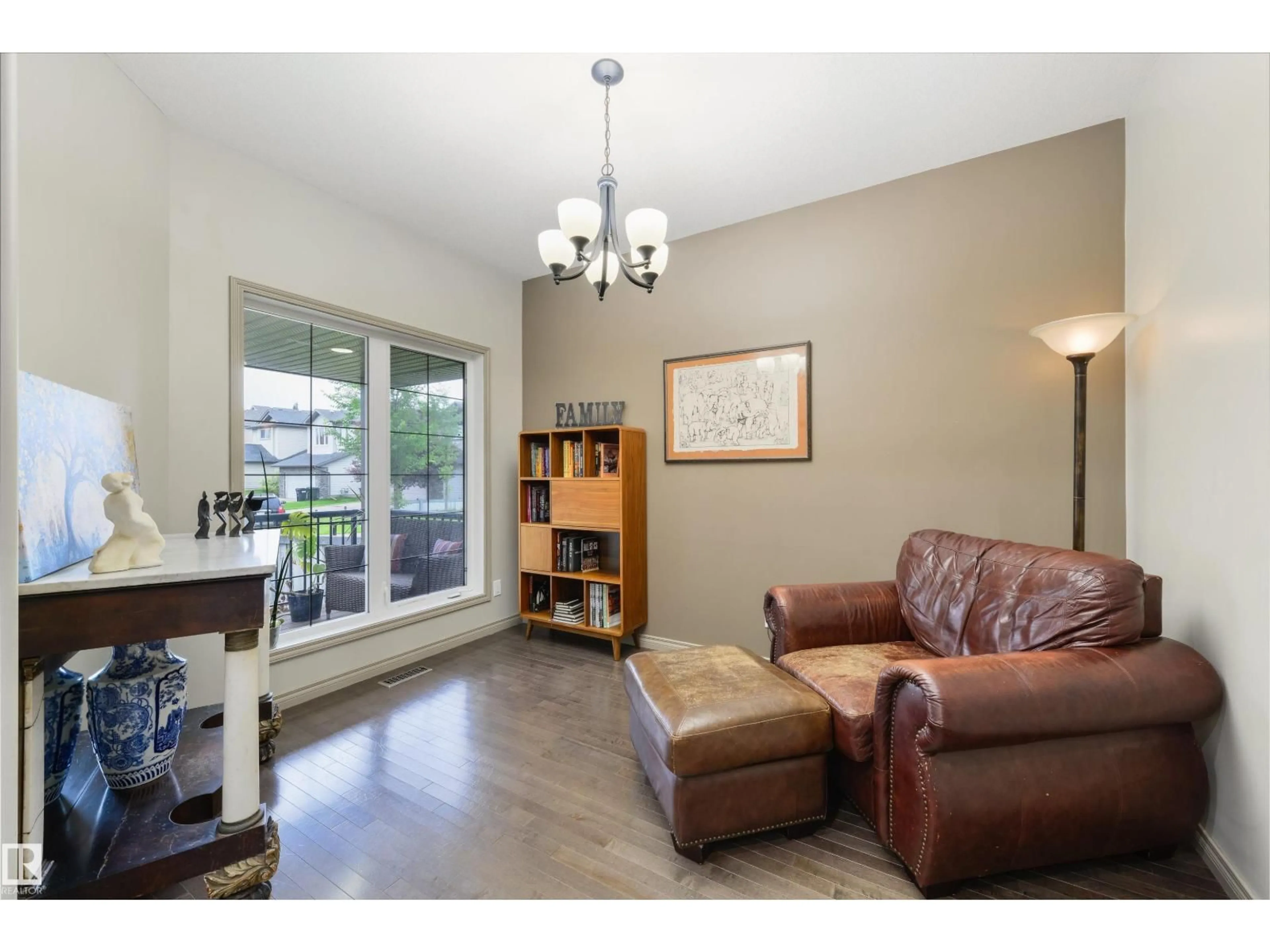 Living room with furniture, wood/laminate floor for 16 ASHTON GA, Spruce Grove Alberta T7X0H8