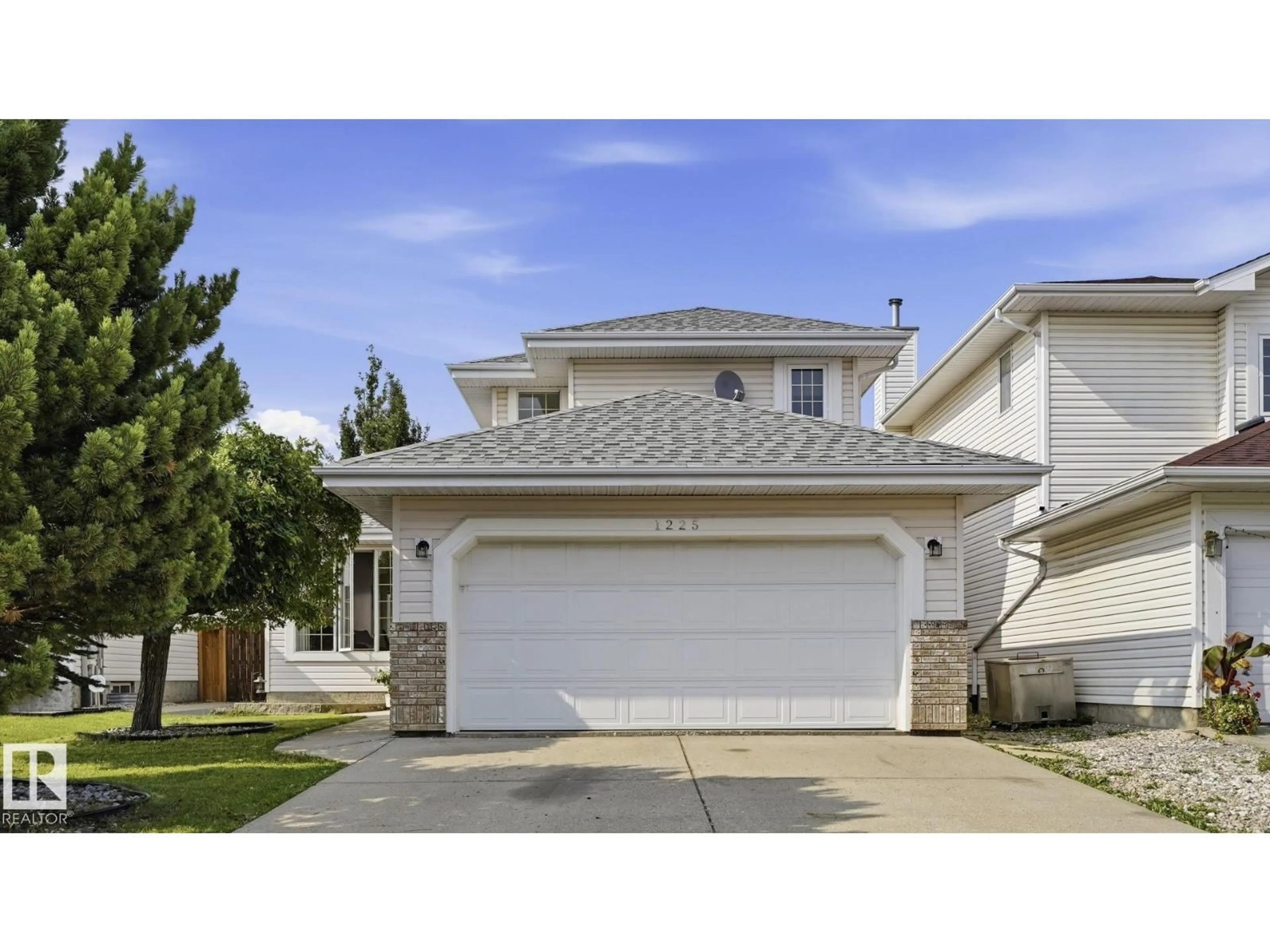 Home with vinyl exterior material, street for NW - 1225 KANE WD, Edmonton Alberta T6L6X7