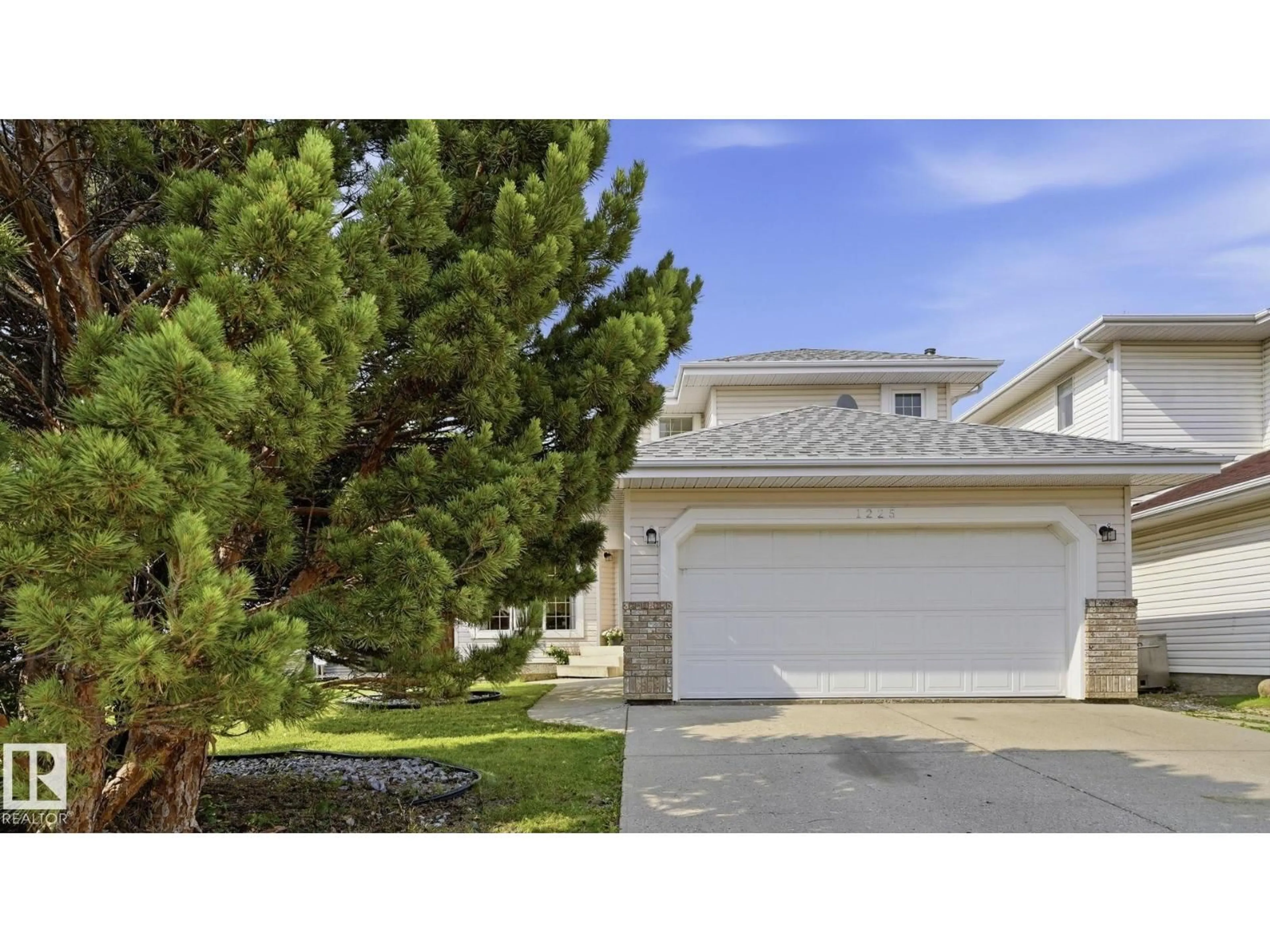 Home with vinyl exterior material, street for NW - 1225 KANE WD, Edmonton Alberta T6L6X7