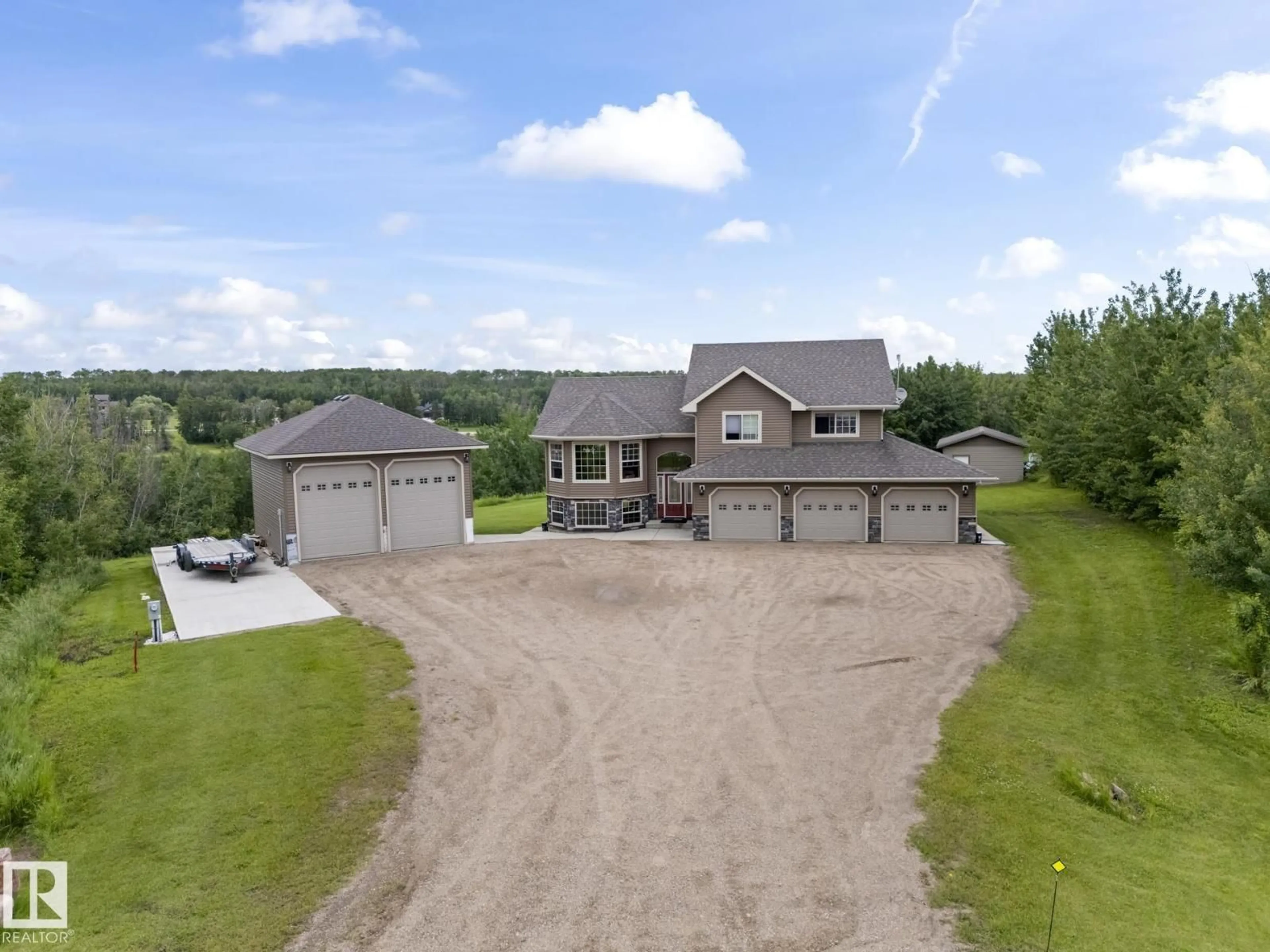 A pic from outside/outdoor area/front of a property/back of a property/a pic from drone, building for 7 - 61130 465 RGE RD, Rural Bonnyville M.D. Alberta T9N2G9