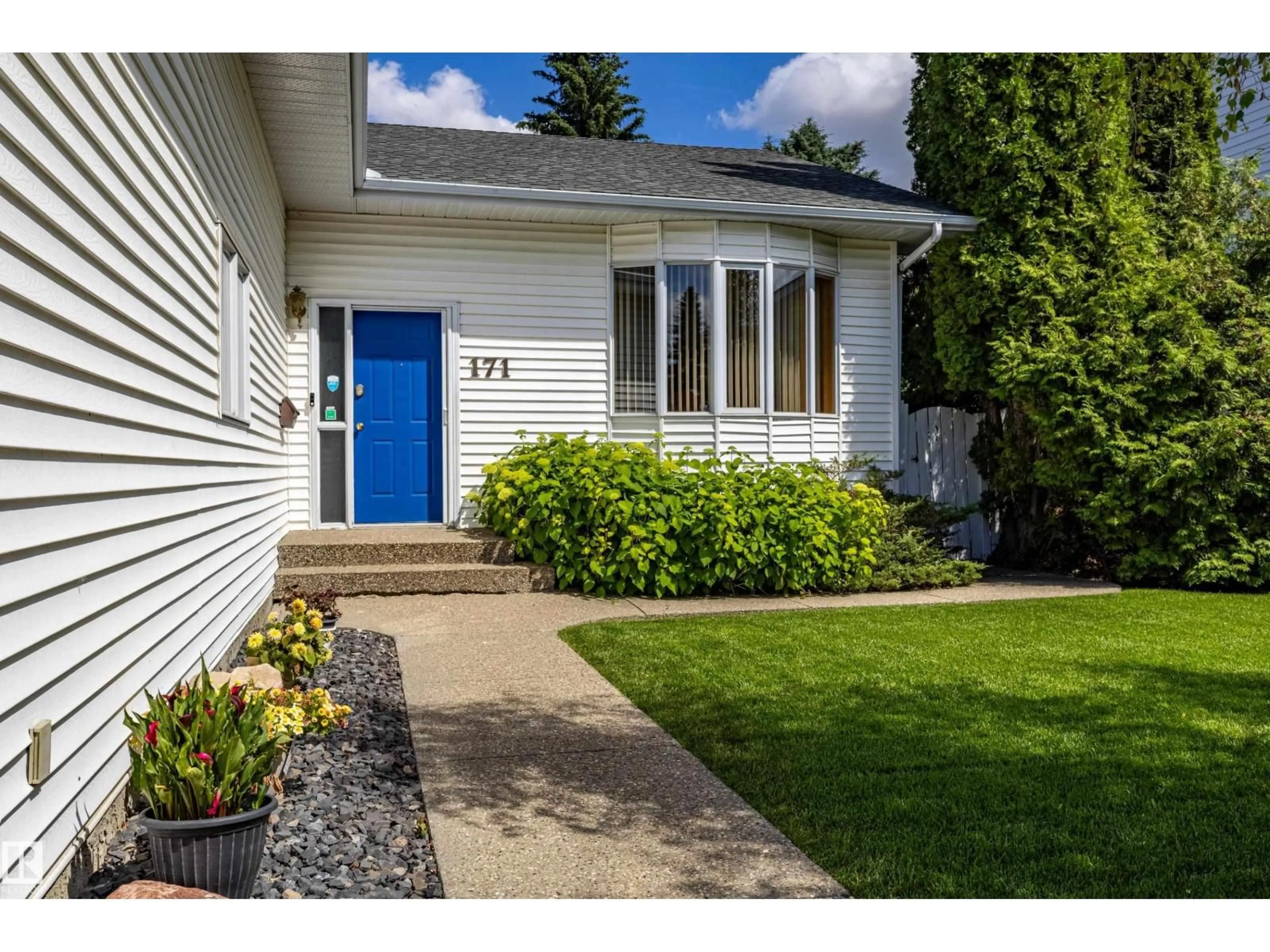 Home with vinyl exterior material, street for 171 RHATIGAN RD, Edmonton Alberta T6R1N5