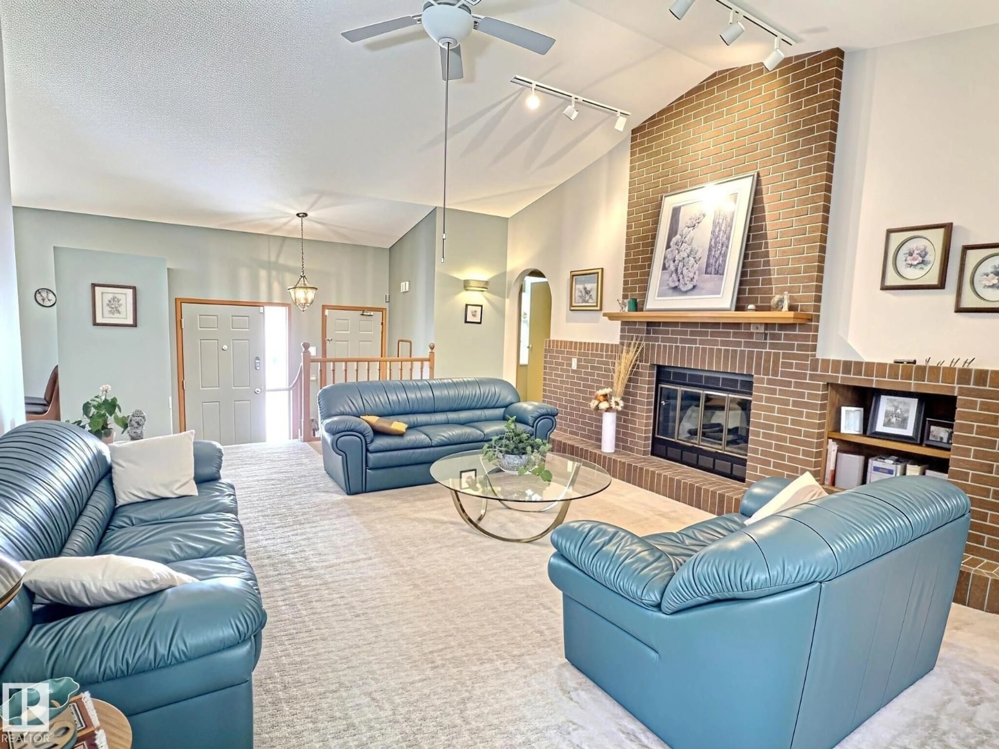 Living room with furniture, ceramic/tile floor for 171 RHATIGAN RD, Edmonton Alberta T6R1N5