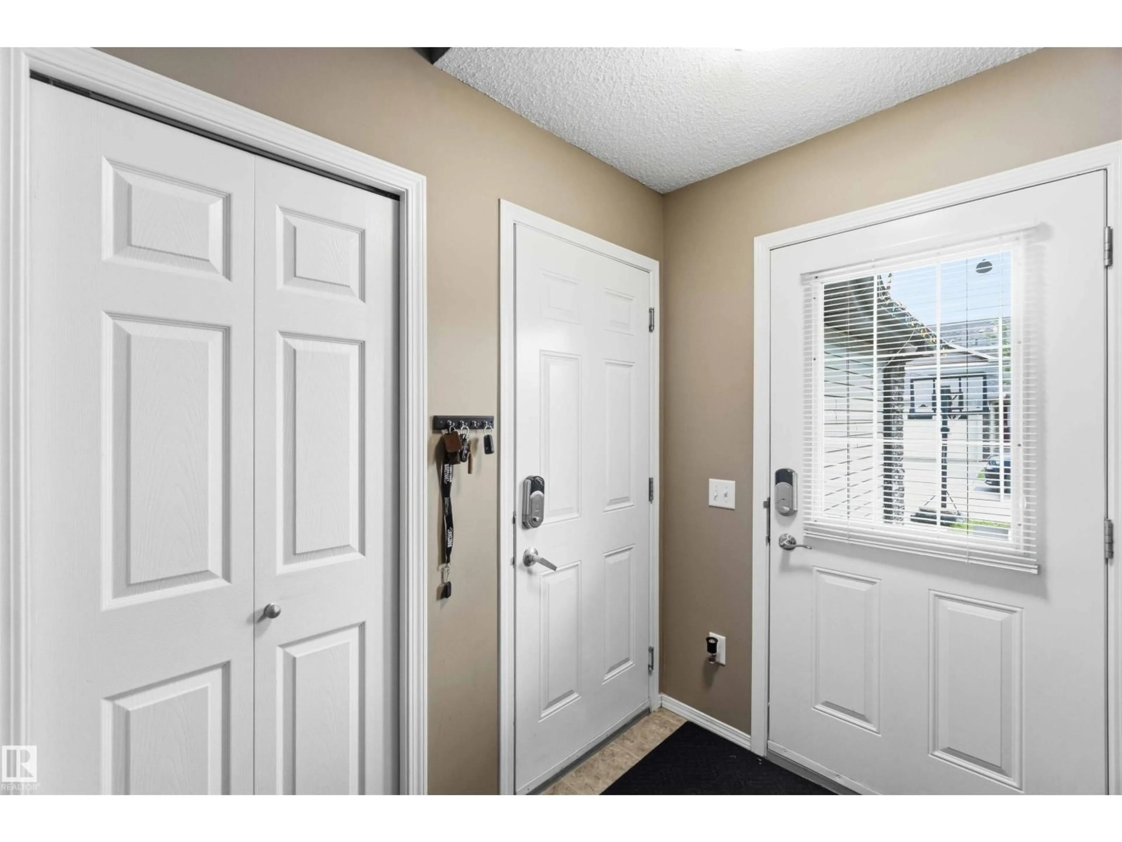 Indoor entryway for #24 - 6520 2 AV, Edmonton Alberta T6X1S4