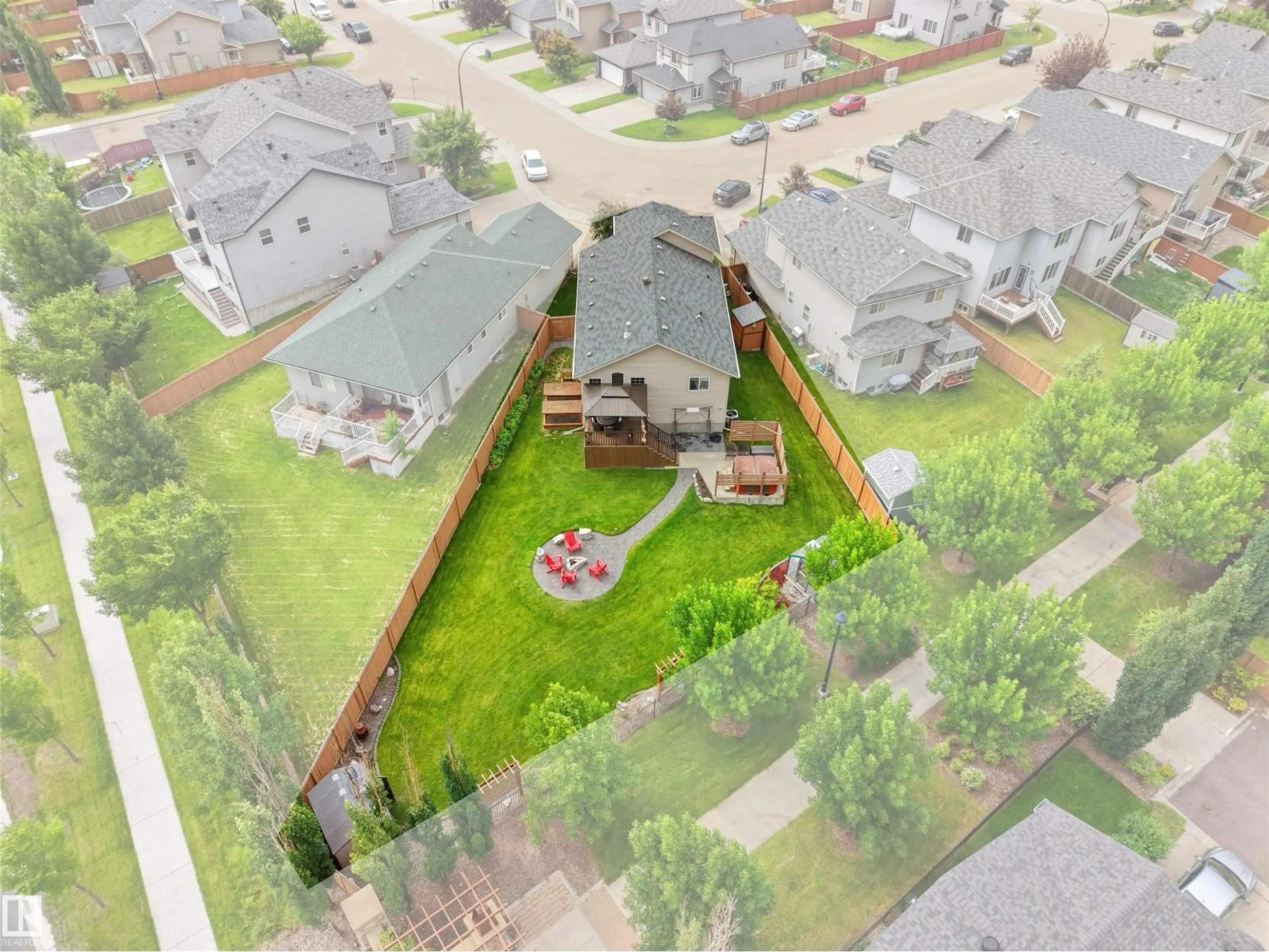 A pic from outside/outdoor area/front of a property/back of a property/a pic from drone, street for 3704 141 AV, Edmonton Alberta T5Y0E3