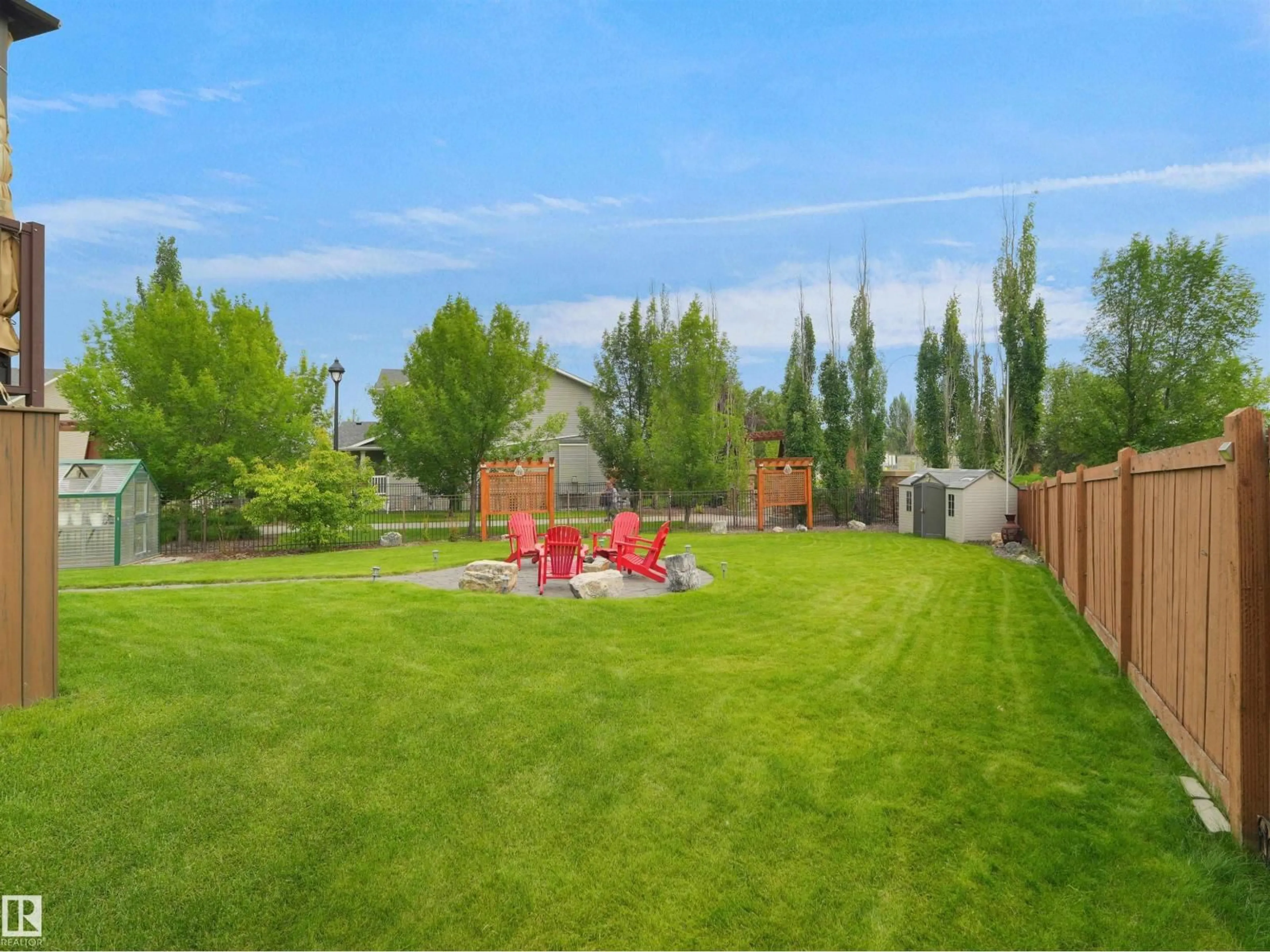 A pic from outside/outdoor area/front of a property/back of a property/a pic from drone, unknown for 3704 141 AV, Edmonton Alberta T5Y0E3