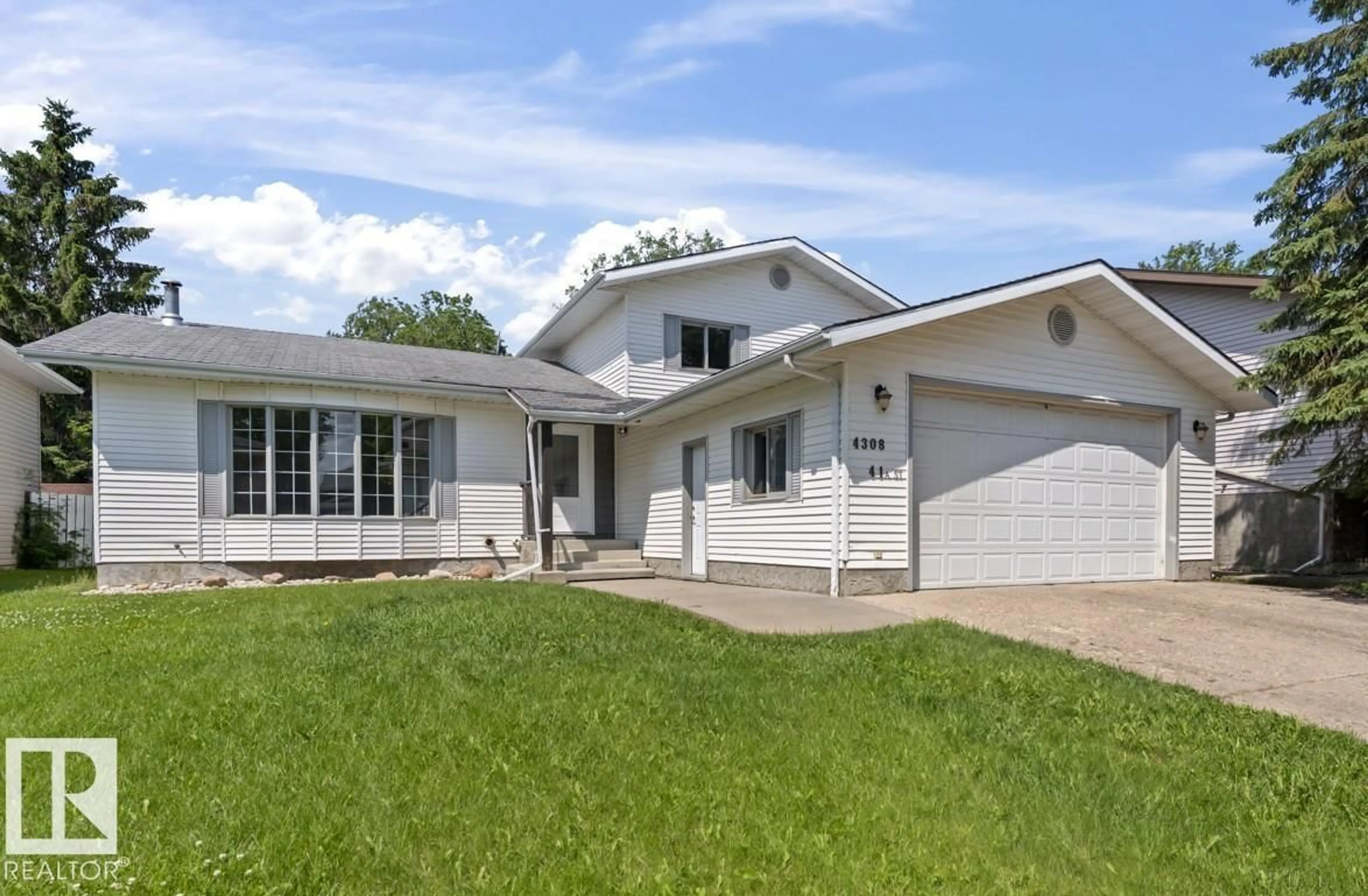 Home with vinyl exterior material, street for 4308 41A ST, Bonnyville Town Alberta T9N1W3