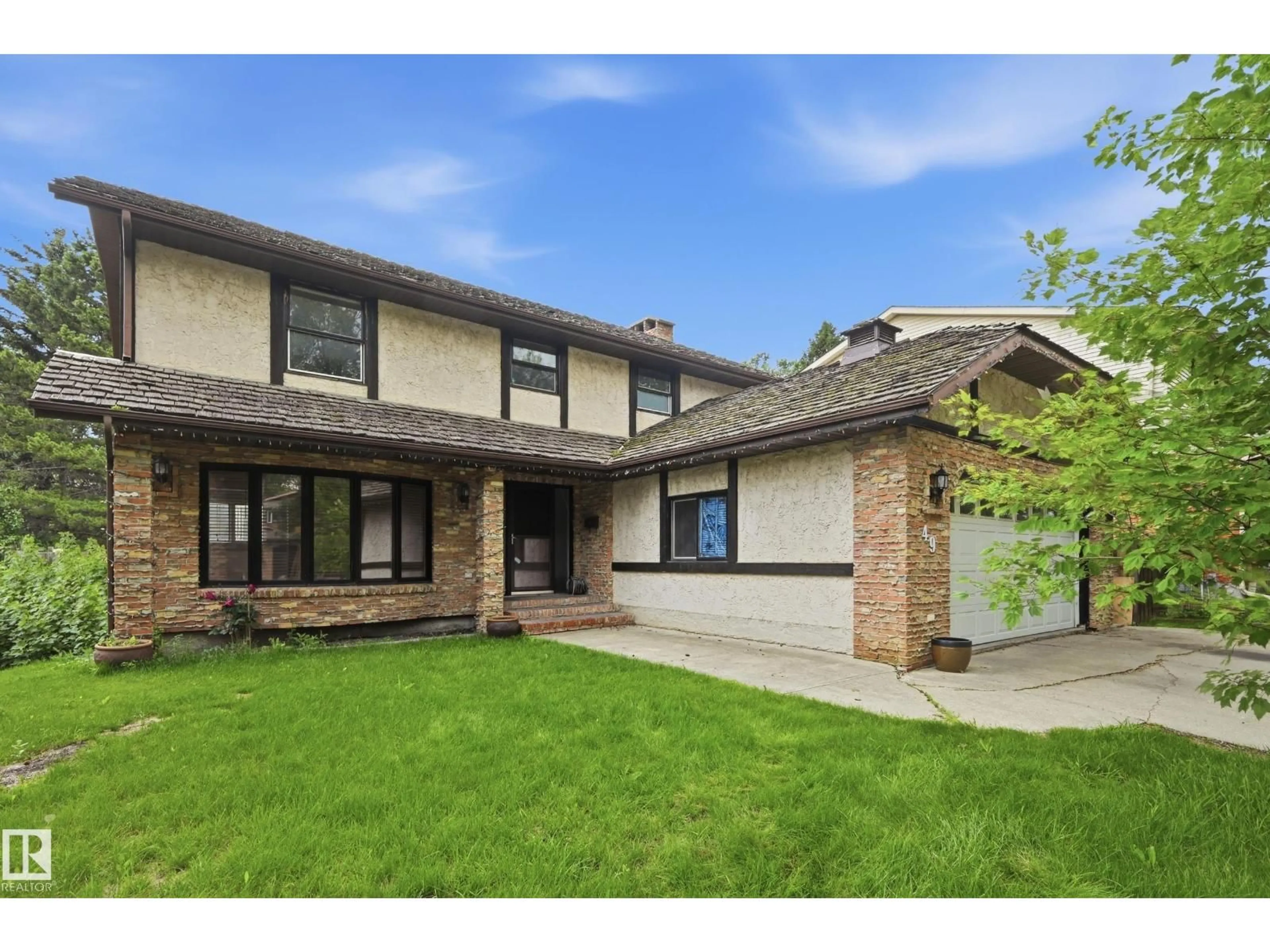 Home with brick exterior material, street for 49 PINERIDGE CR, St. Albert Alberta T8N4P6
