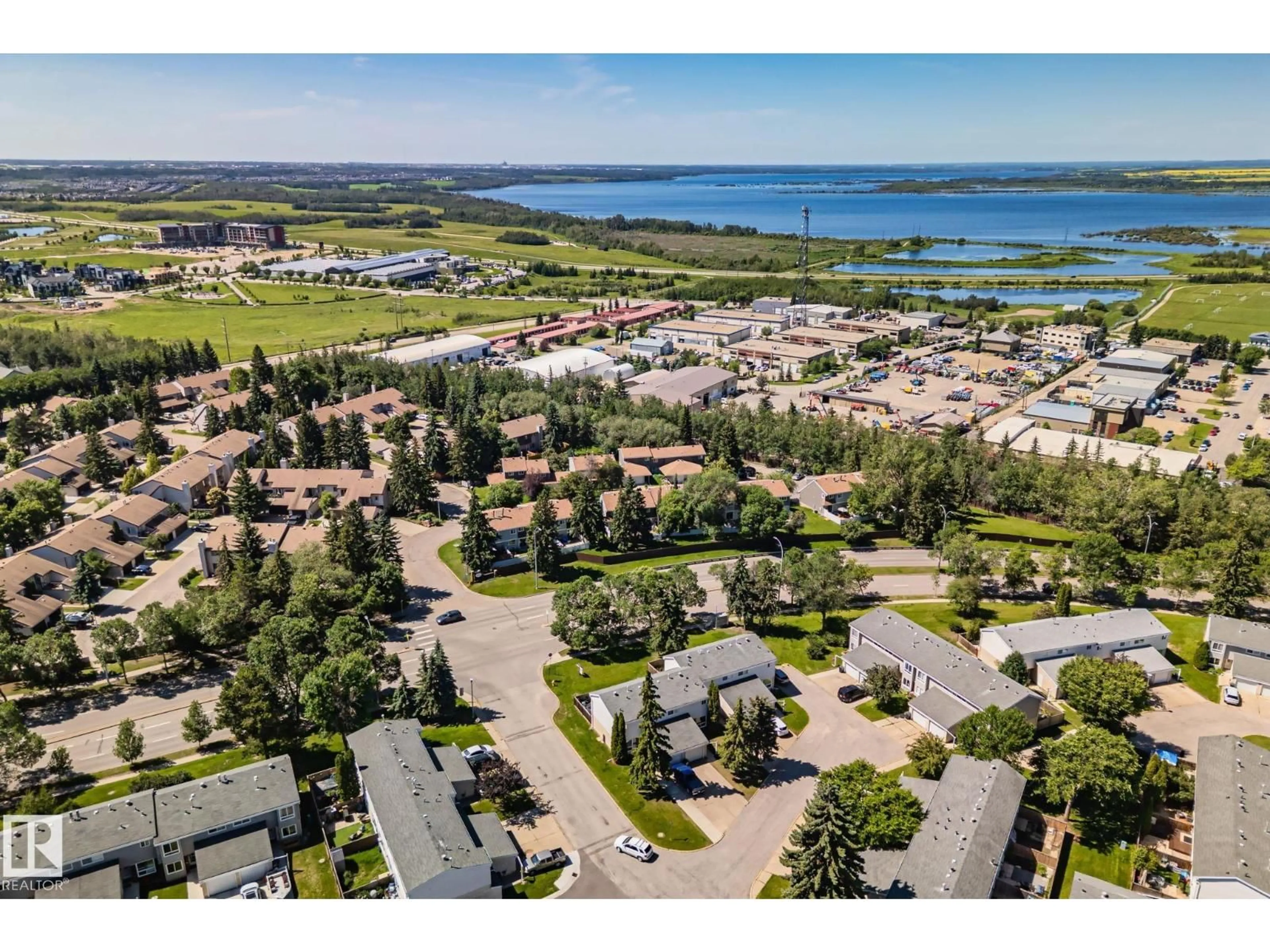 A pic from outside/outdoor area/front of a property/back of a property/a pic from drone, water/lake/river/ocean view for 15 GRANDIN WO, St. Albert Alberta T8N2Y4