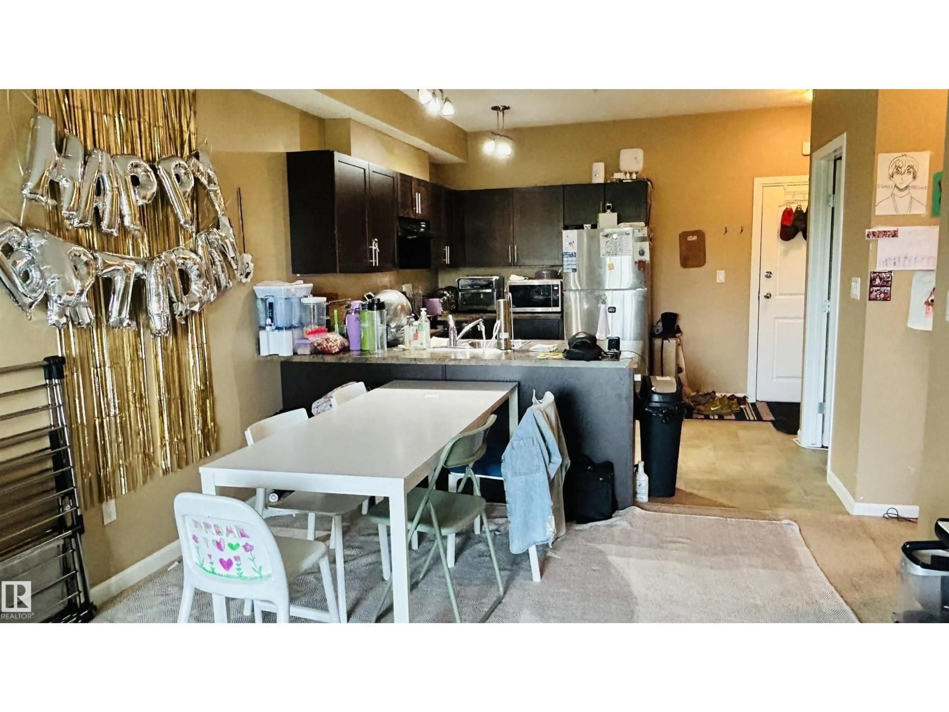 Open concept kitchen, ceramic/tile floor for #211 - 5302 51 ST, Bonnyville Town Alberta T9N2E3