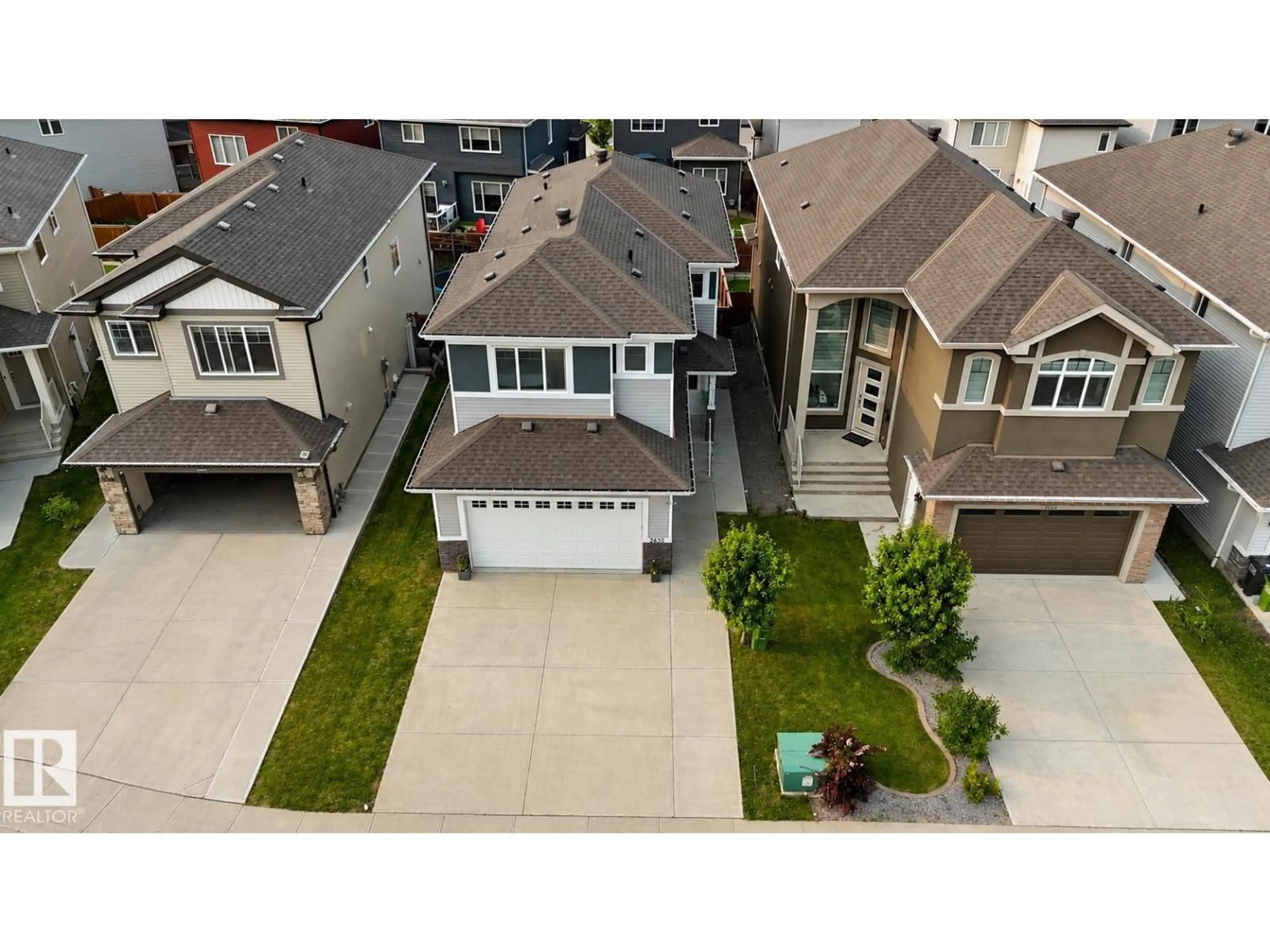 A pic from outside/outdoor area/front of a property/back of a property/a pic from drone, street for 2630 16A AVE AVE, Edmonton Alberta T6T2H6