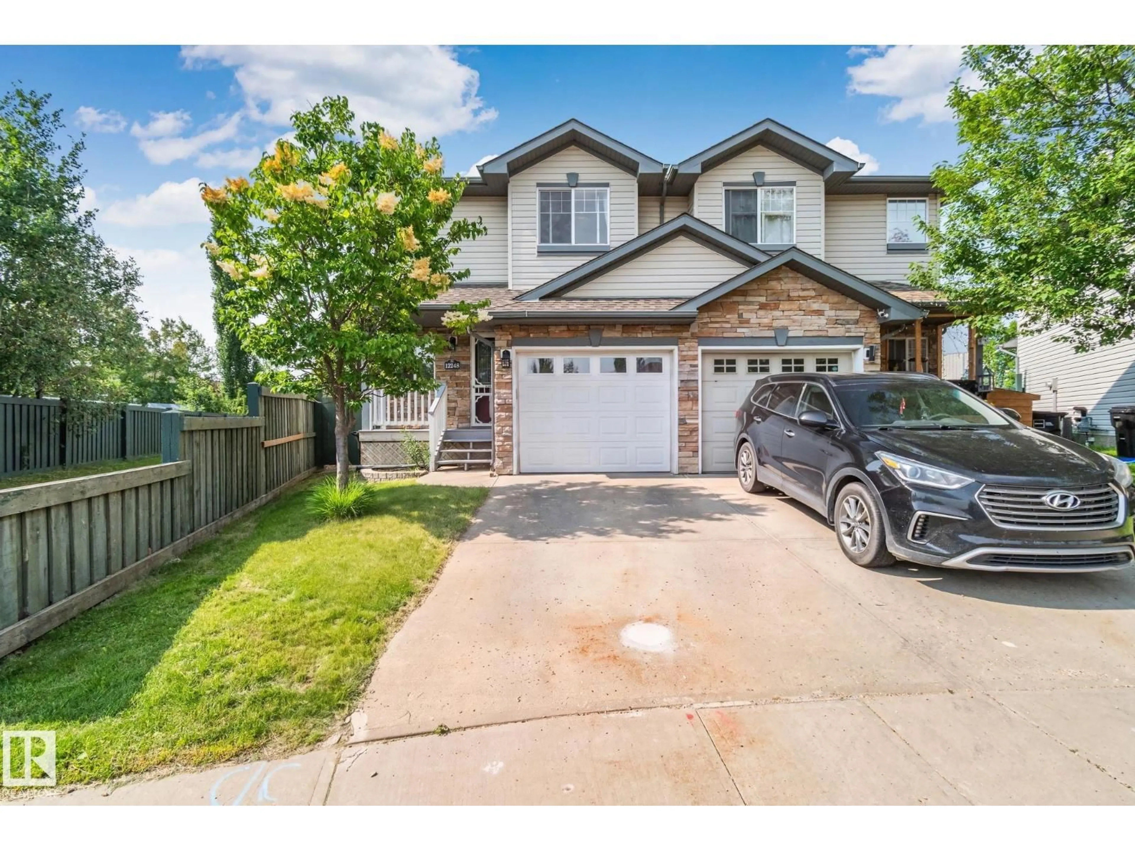 A pic from outside/outdoor area/front of a property/back of a property/a pic from drone, street for SW SW - 12248 16 AV, Edmonton Alberta T6W1L7