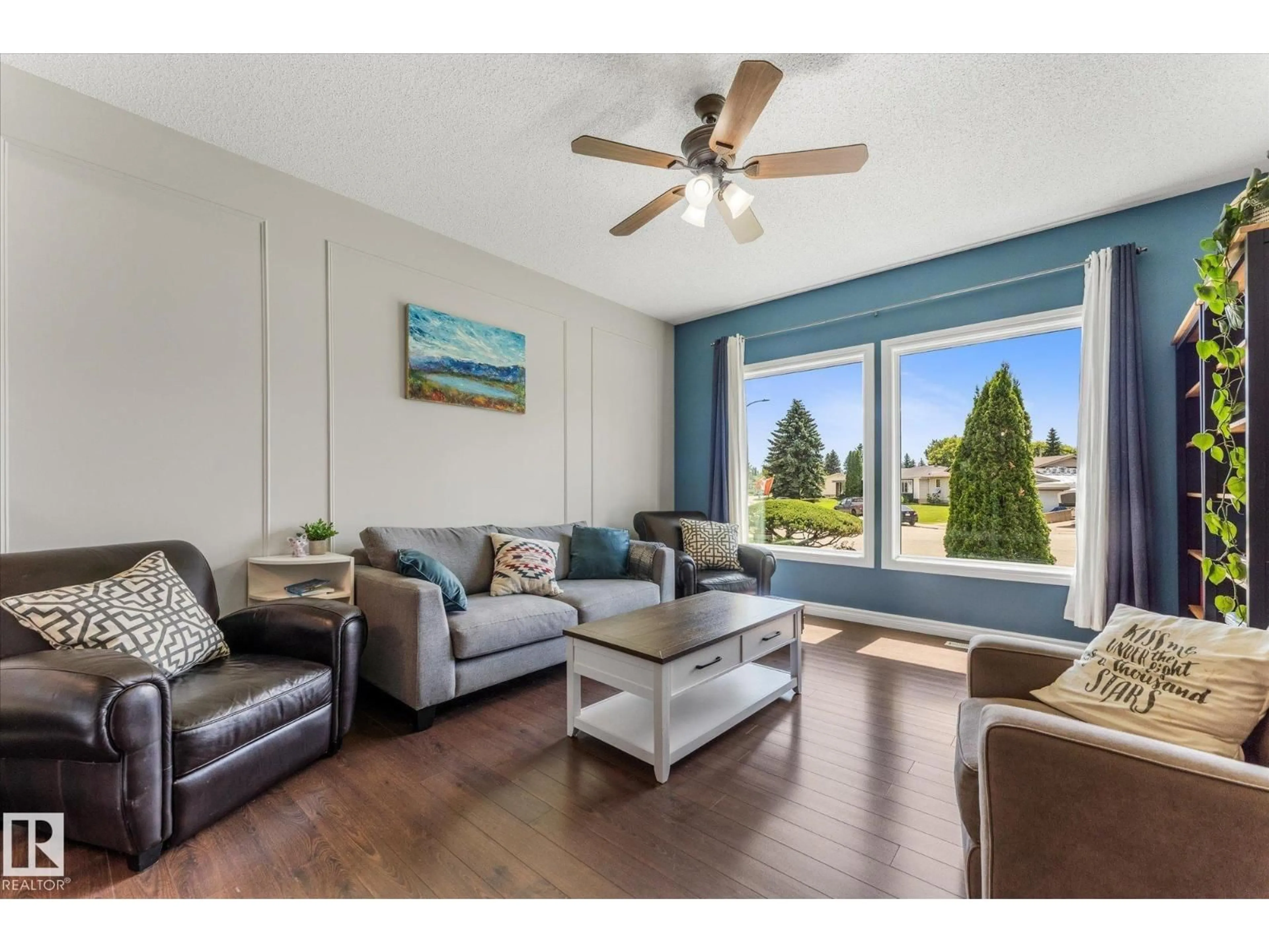 Living room with furniture, wood/laminate floor for 20 GALEN CR, Sherwood Park Alberta T8N2L2