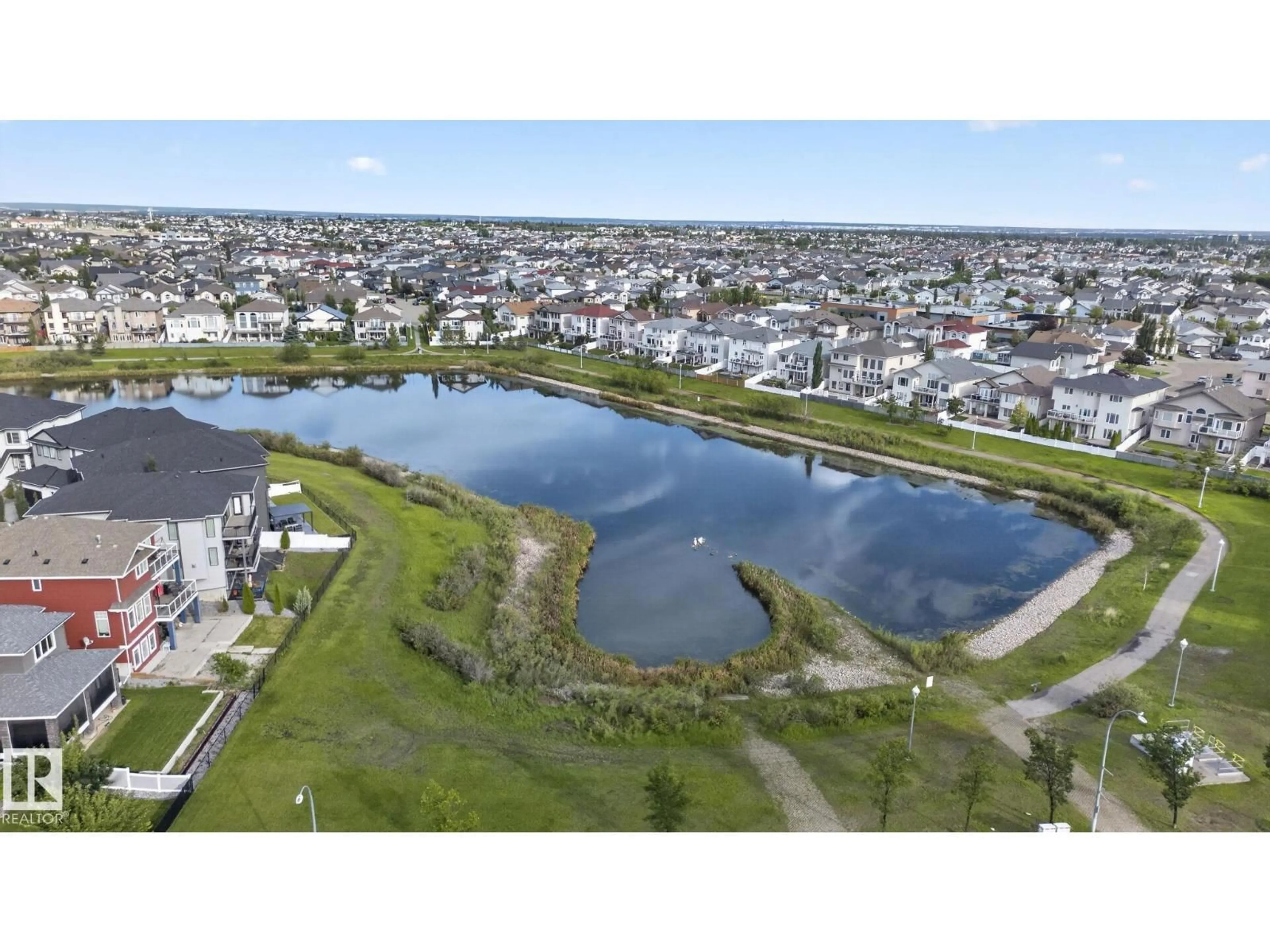 A pic from outside/outdoor area/front of a property/back of a property/a pic from drone, water/lake/river/ocean view for NW - 7858 170A AV, Edmonton Alberta T5Z0C9