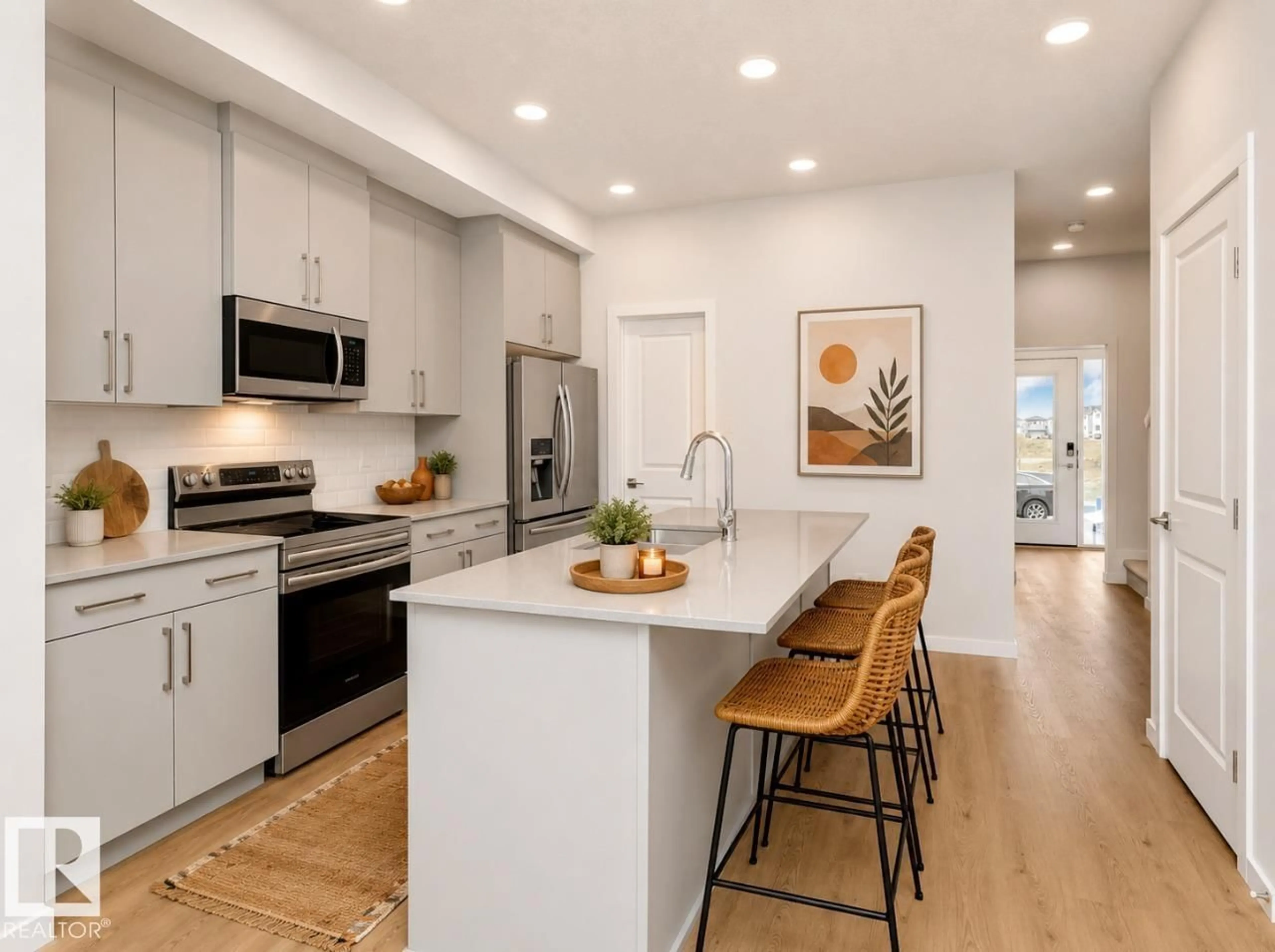 Open concept kitchen, wood/laminate floor for 2804 7 AV, Edmonton Alberta T6X2A8