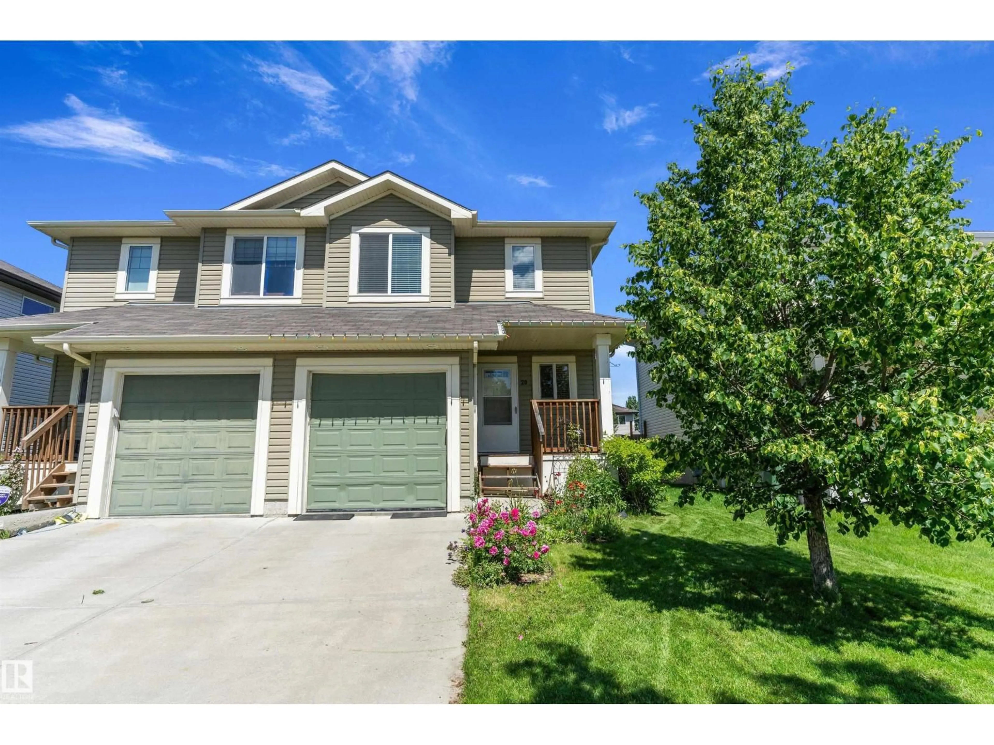 Home with vinyl exterior material, street for 20 DUNLOP WD, Leduc Alberta T9E0N2