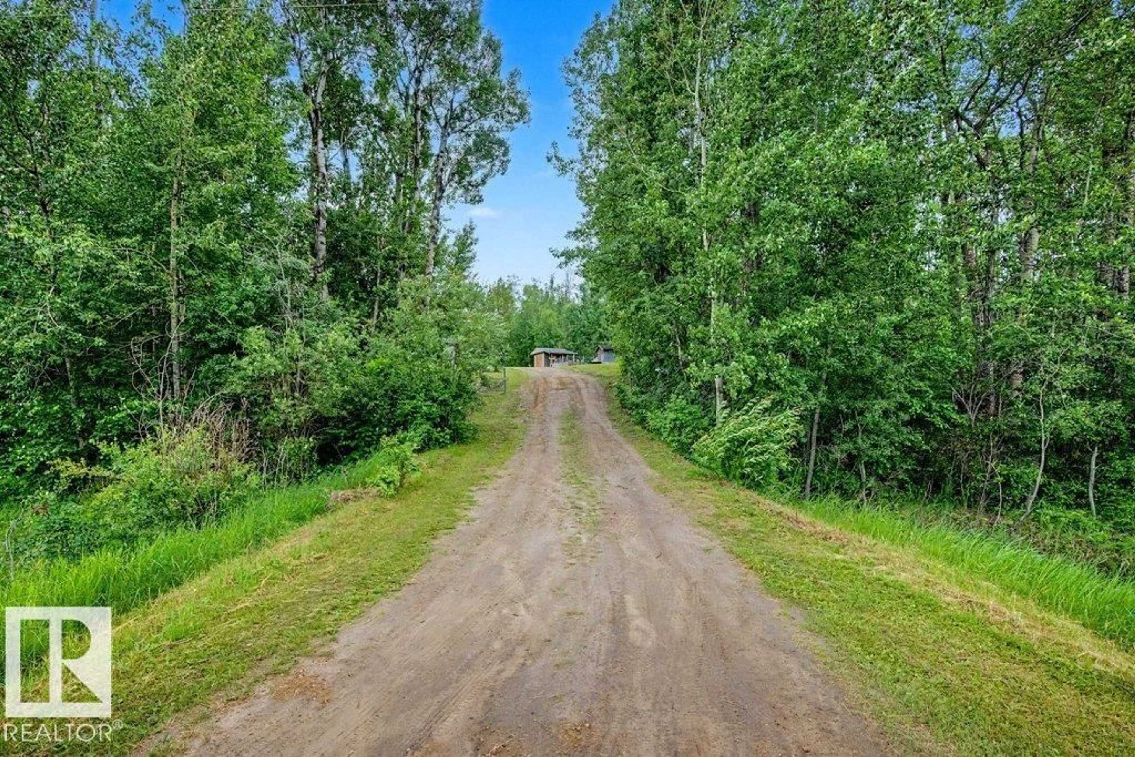 A pic from outside/outdoor area/front of a property/back of a property/a pic from drone, forest/trees view for 30 53304 RGE ROAD 32, Rural Parkland County Alberta T0E0N0