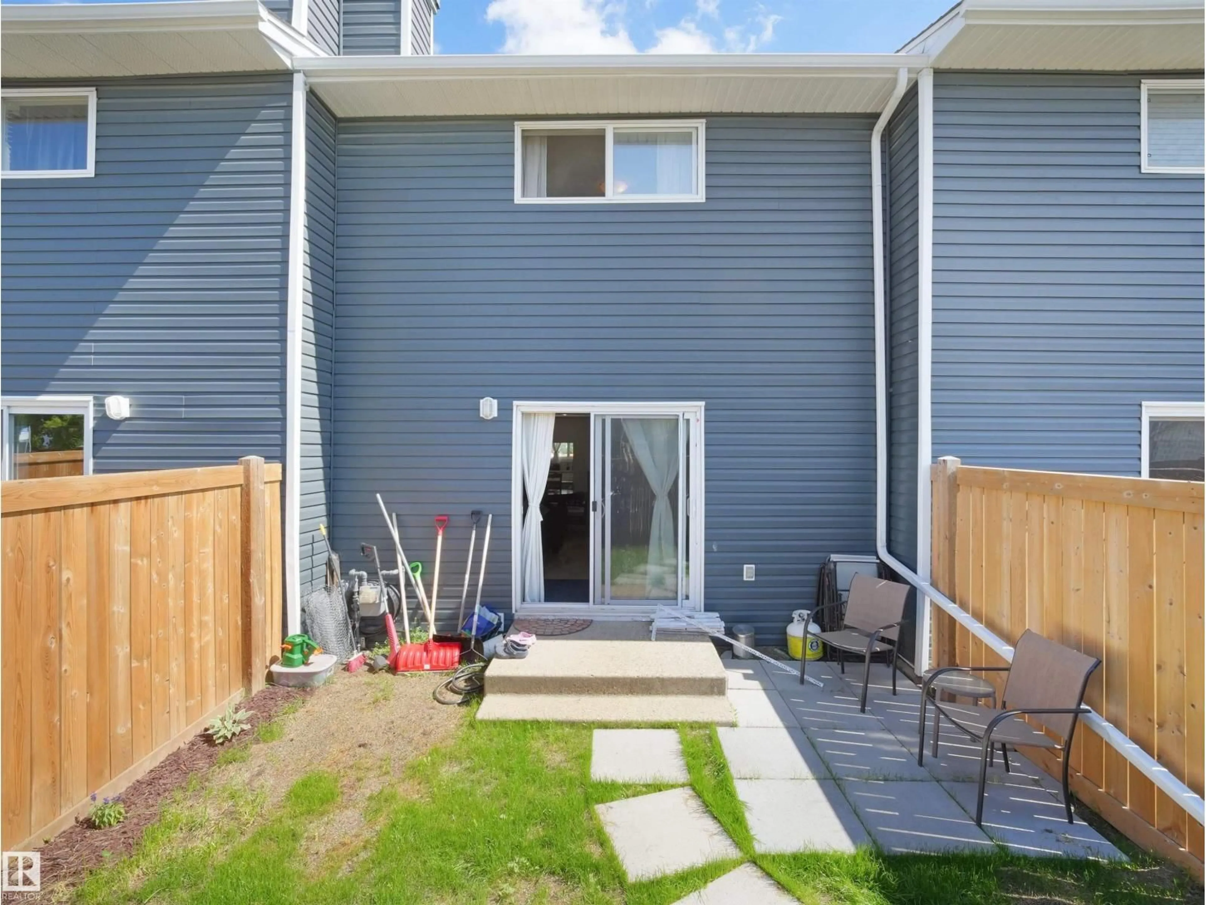 Home with vinyl exterior material, street for 575 DUNLUCE RD, Edmonton Alberta T5X4P4