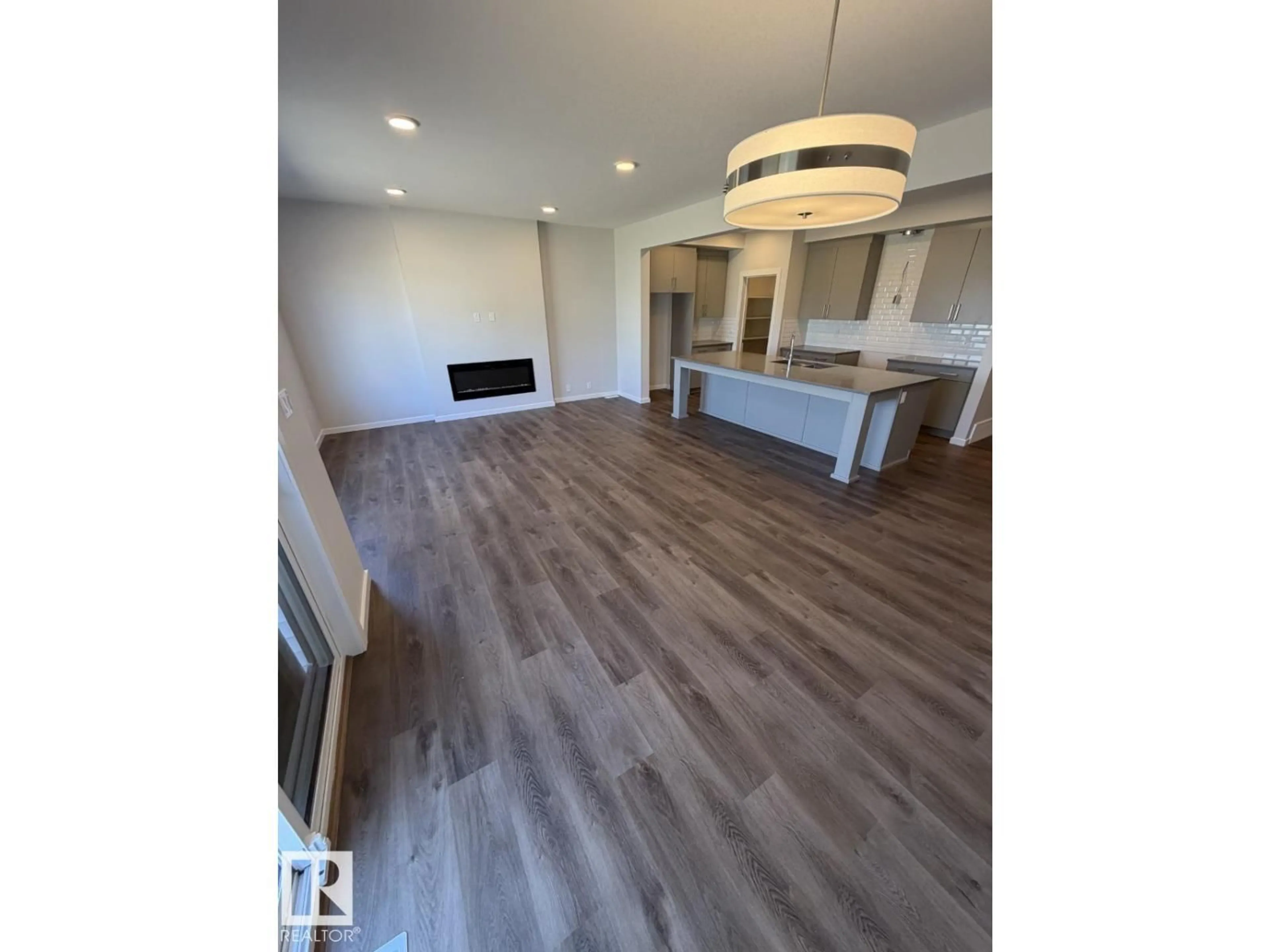Open concept kitchen, wood/laminate floor for 2476 EGRET LO, Edmonton Alberta T6M3R4