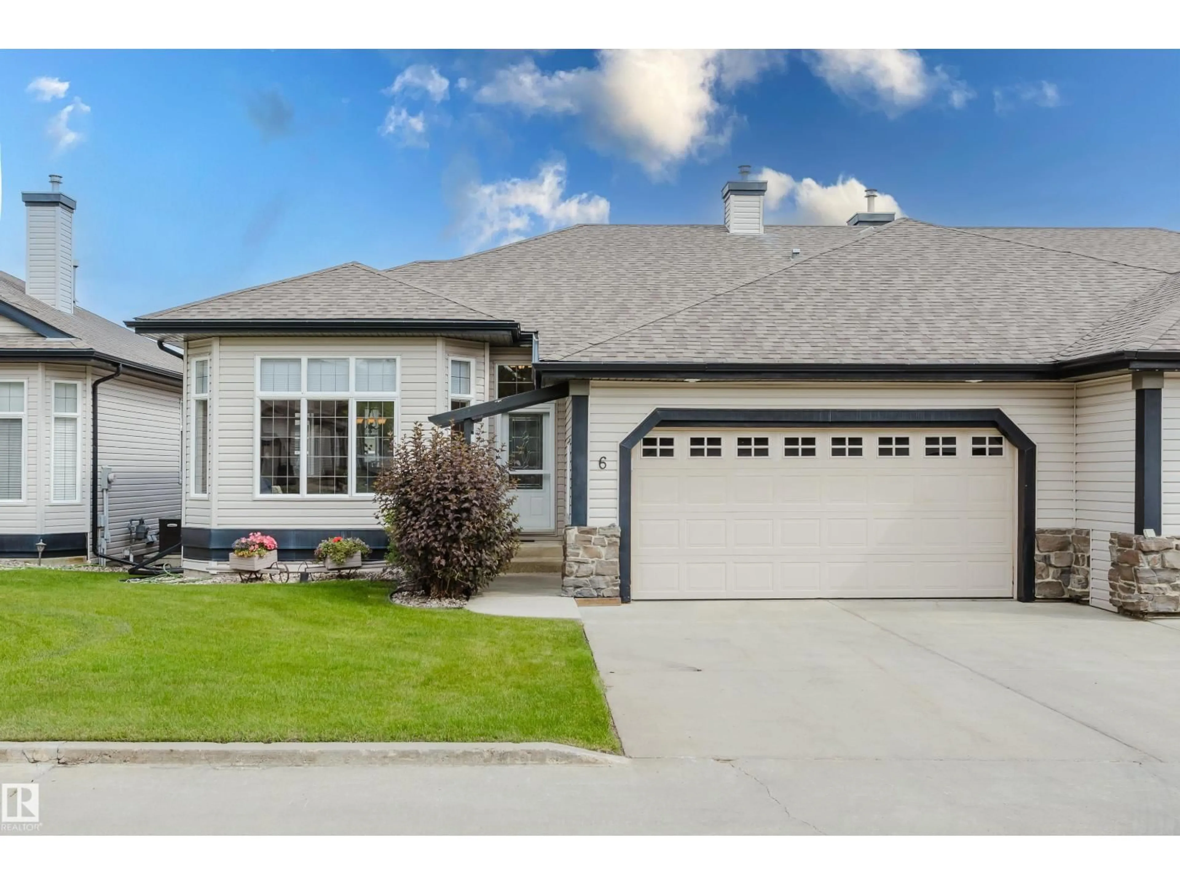 Home with vinyl exterior material, street for #6 - 12504 15 AV, Edmonton Alberta T6W1X1