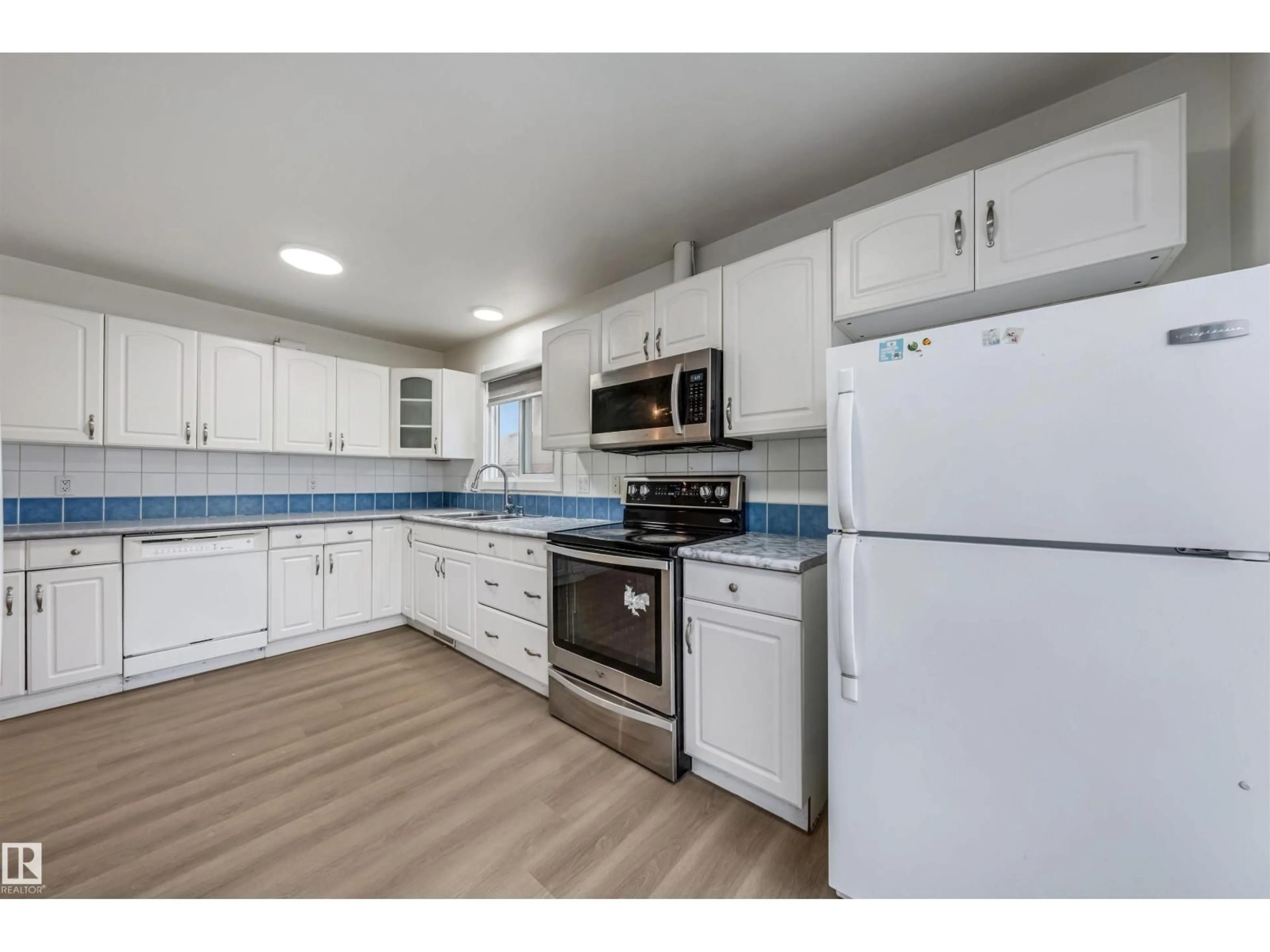 Standard kitchen, ceramic/tile floor for 2831 36 ST, Edmonton Alberta T6L3Y6