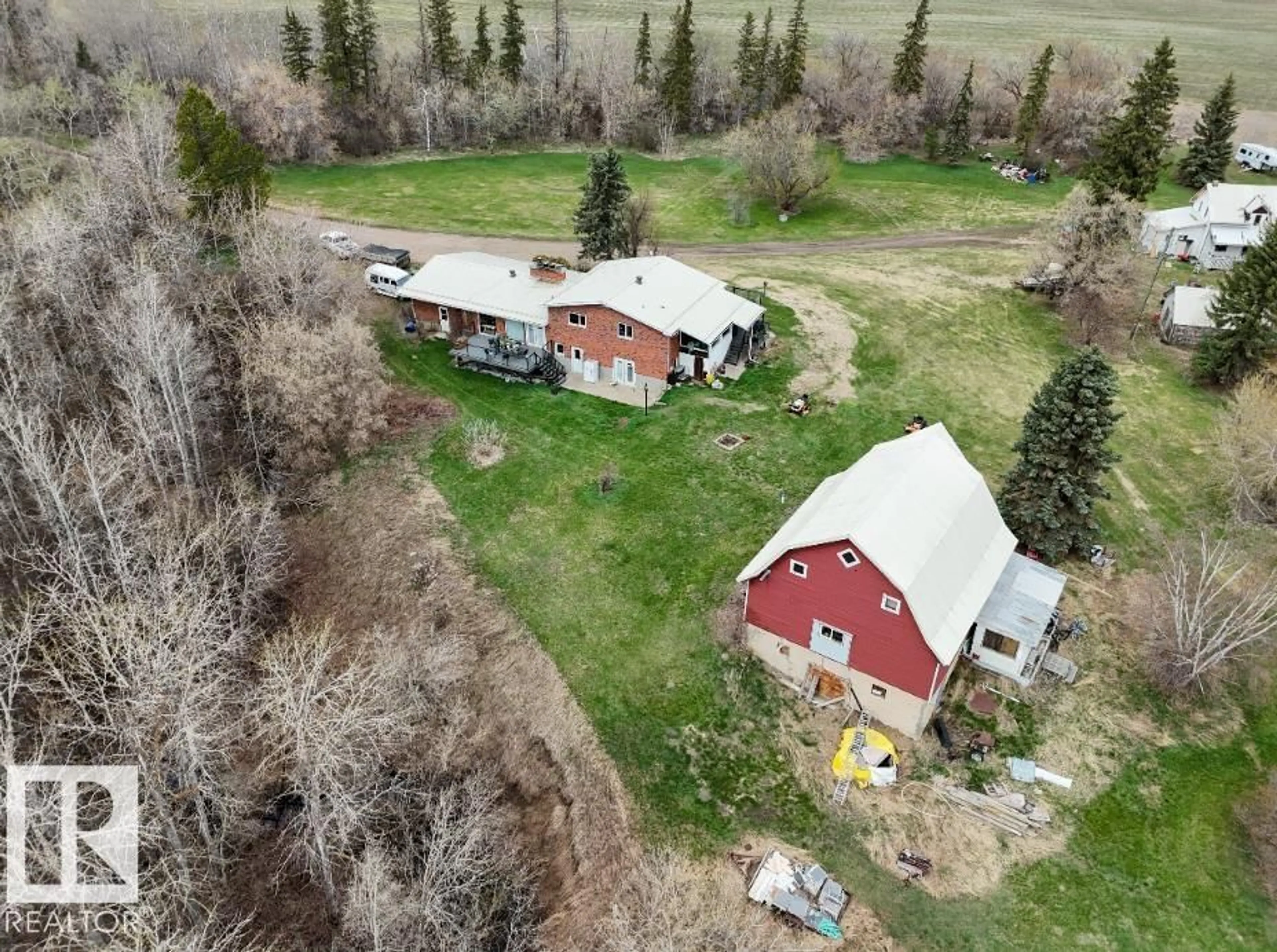 A pic from outside/outdoor area/front of a property/back of a property/a pic from drone, unknown for 56505 RANGE ROAD 233, Rural Sturgeon County Alberta T0A1N0