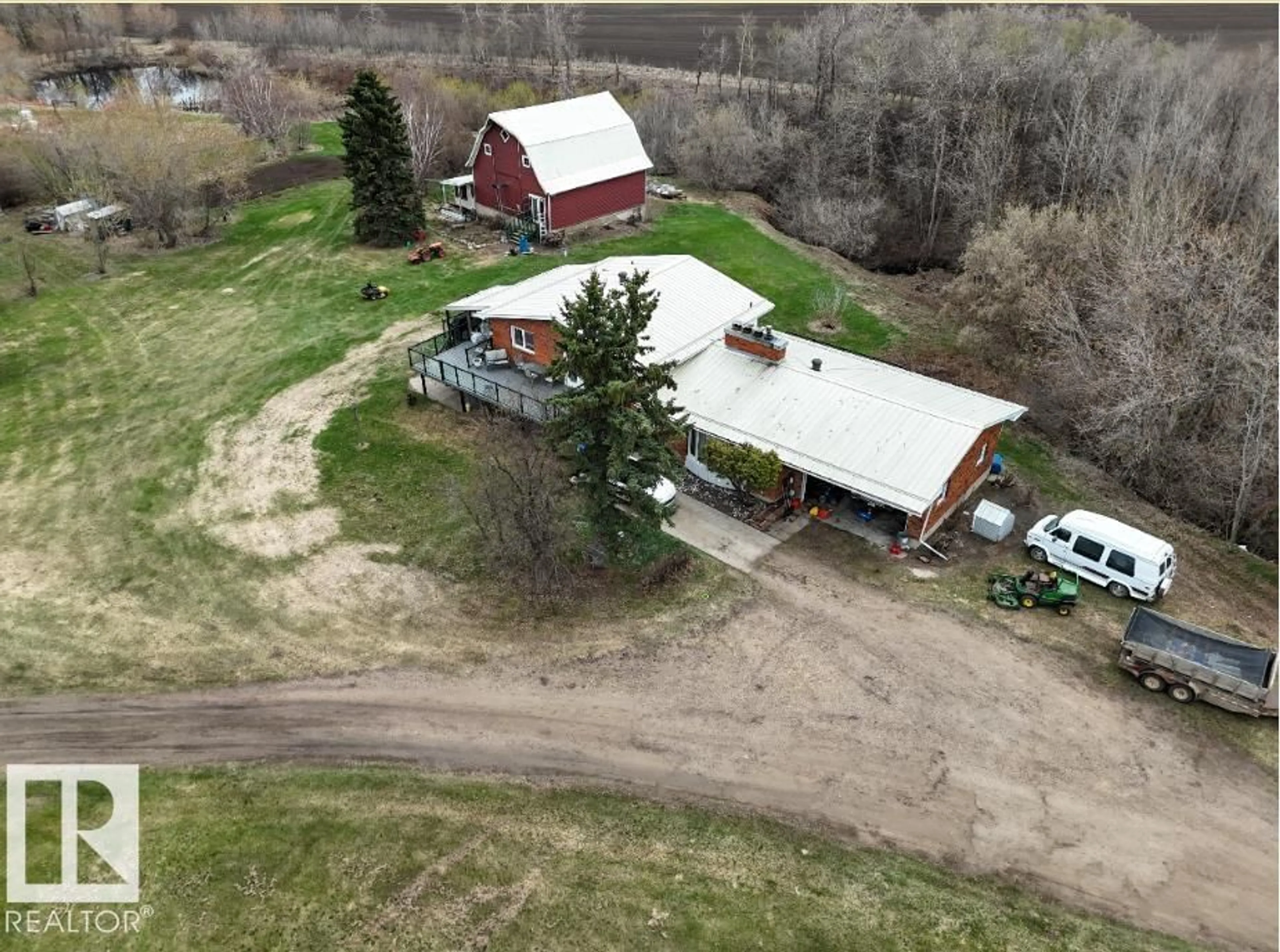 A pic from outside/outdoor area/front of a property/back of a property/a pic from drone, building for 56505 RANGE ROAD 233, Rural Sturgeon County Alberta T0A1N0