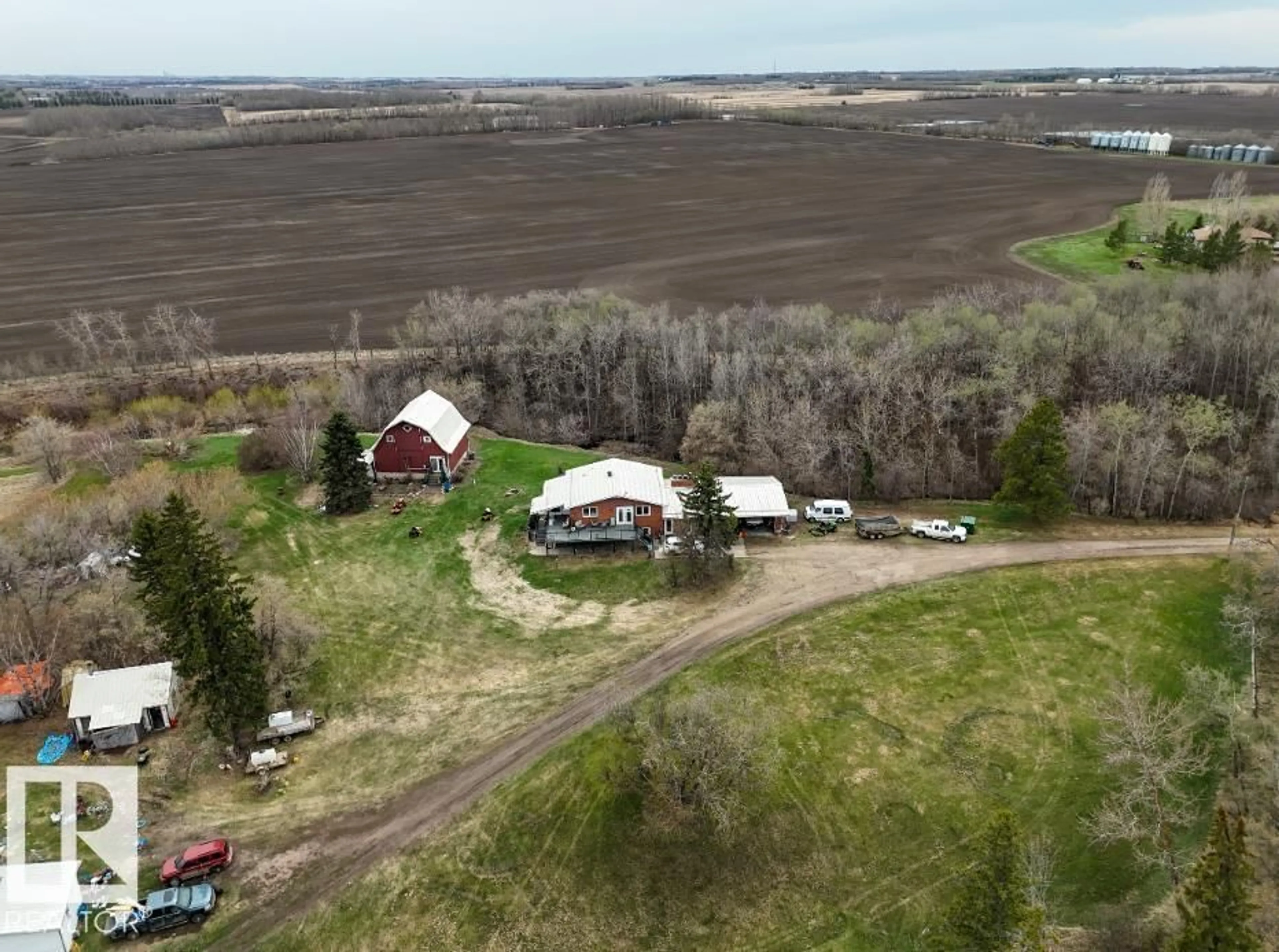A pic from outside/outdoor area/front of a property/back of a property/a pic from drone, unknown for 56505 RANGE ROAD 233, Rural Sturgeon County Alberta T0A1N0
