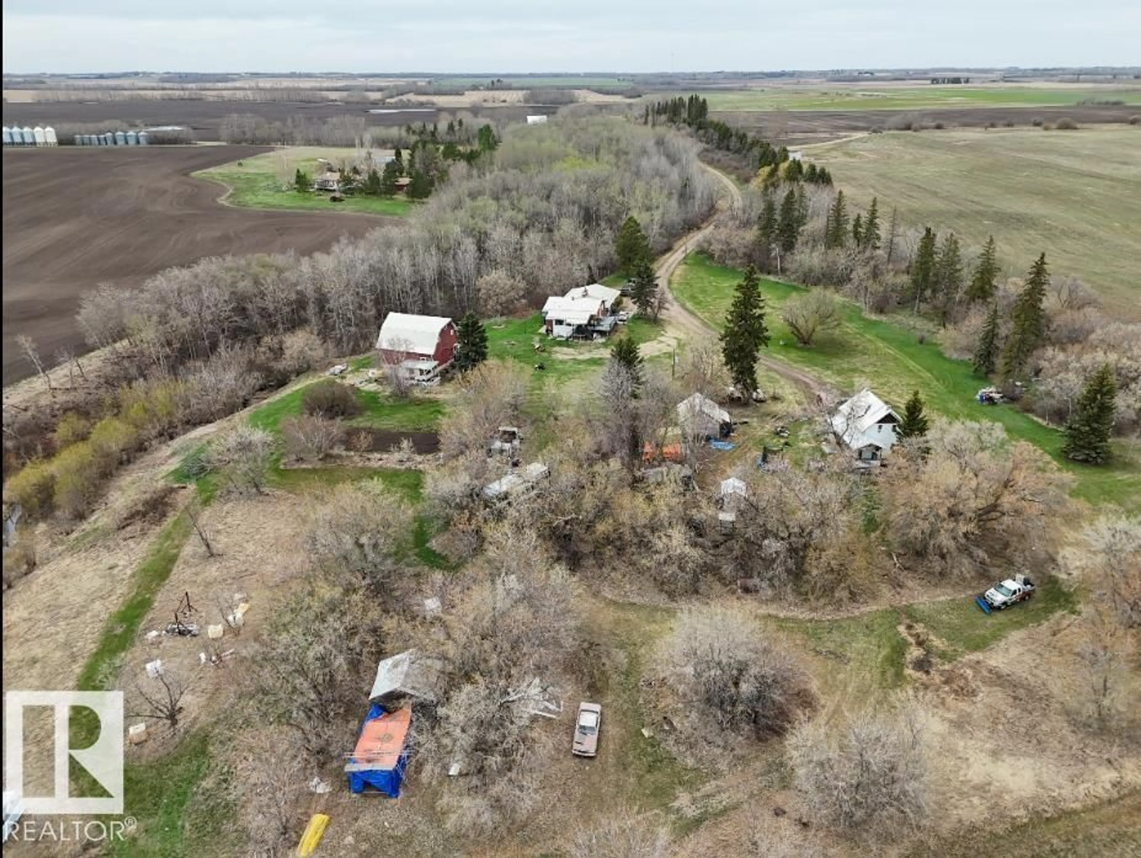 A pic from outside/outdoor area/front of a property/back of a property/a pic from drone, unknown for 56505 RANGE ROAD 233, Rural Sturgeon County Alberta T0A1N0