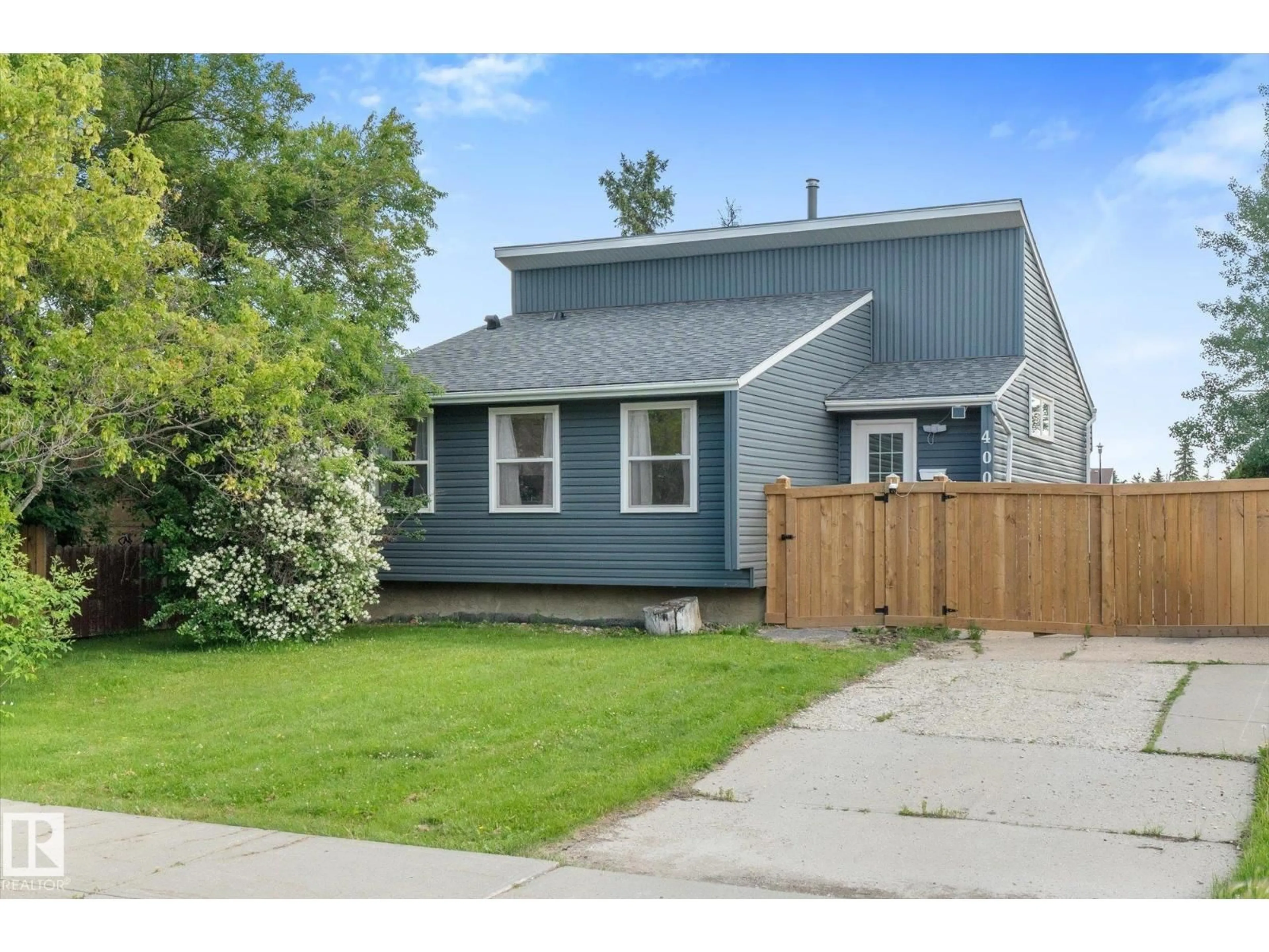 Home with vinyl exterior material, street for 4009 37 AV NW, Leduc Alberta T9E6E1