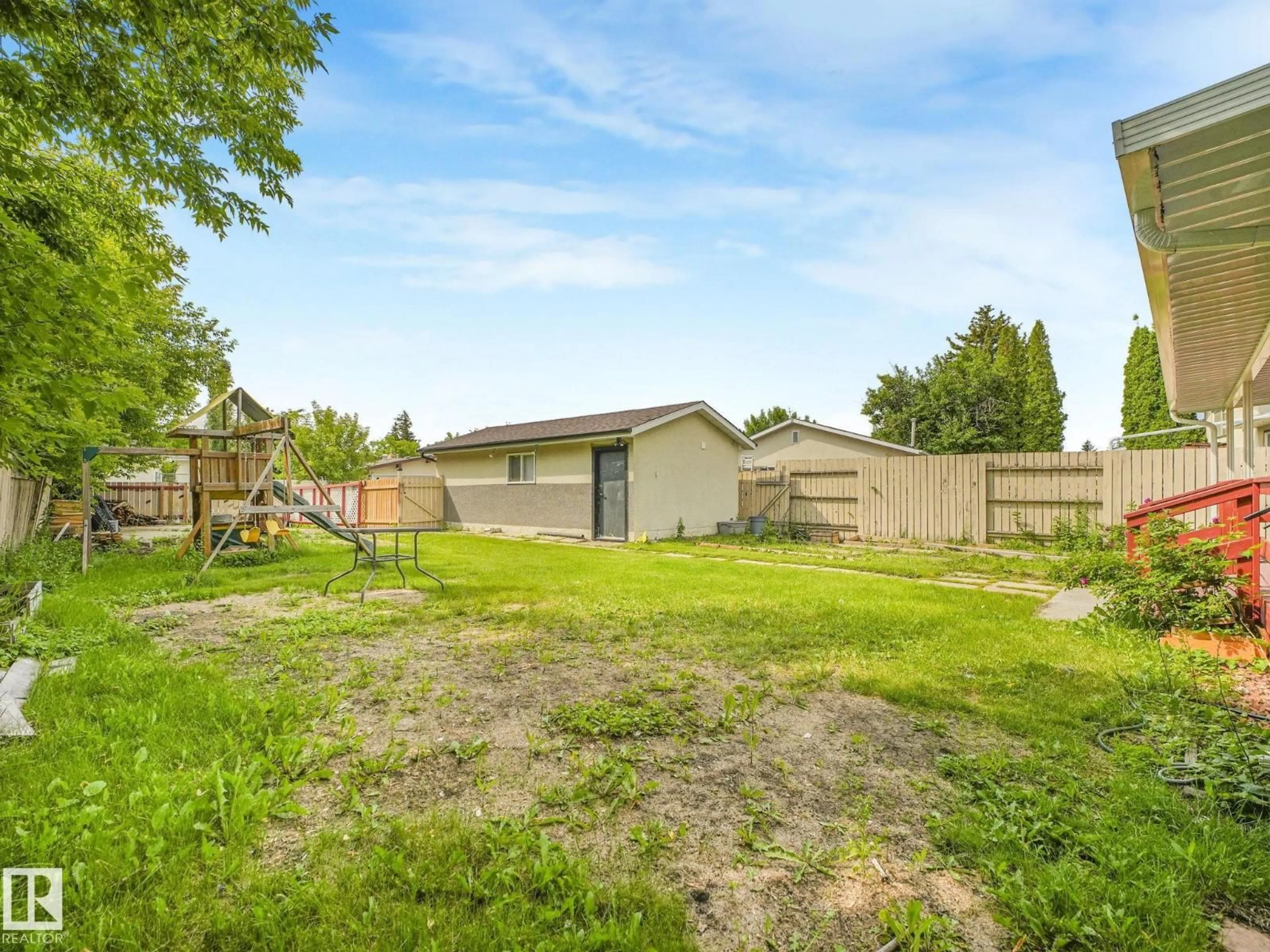 A pic from outside/outdoor area/front of a property/back of a property/a pic from drone, street for 9315 151 AV, Edmonton Alberta T5E2R1