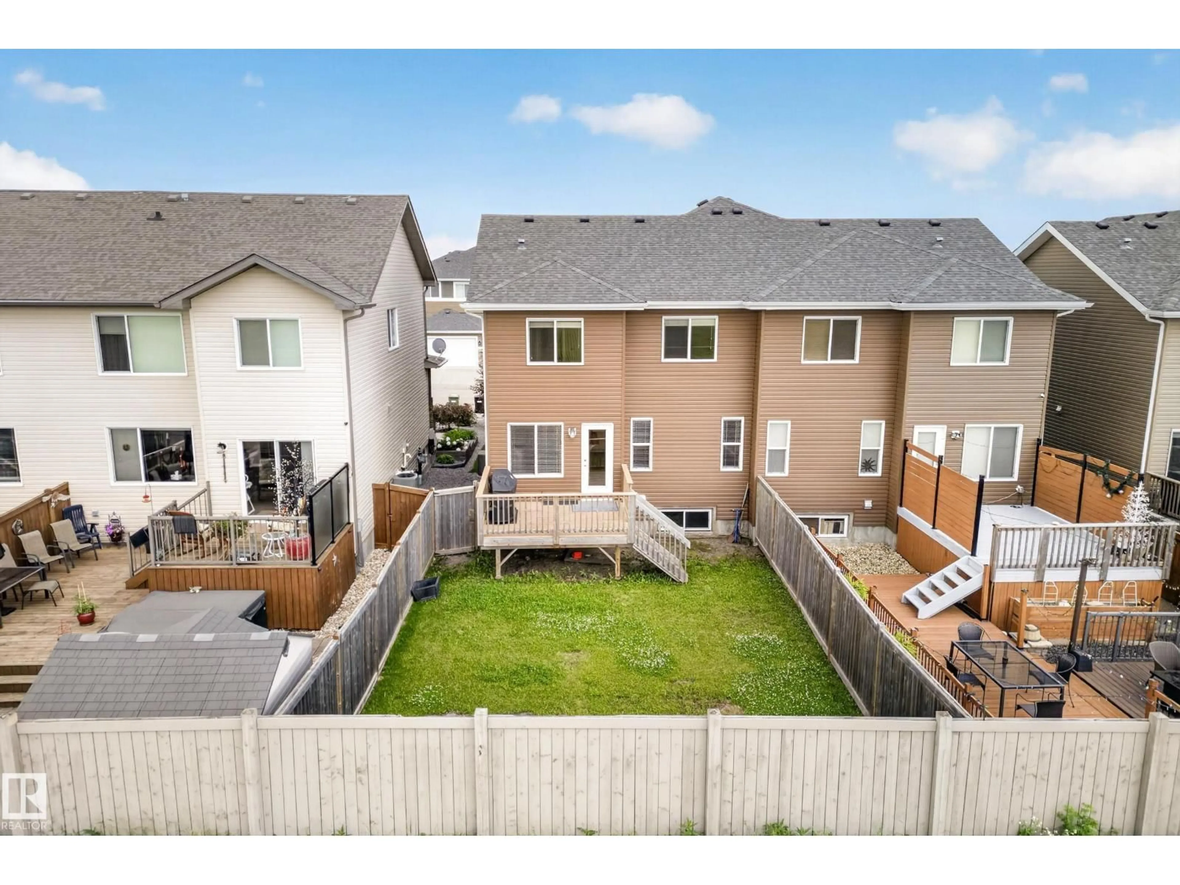 A pic from outside/outdoor area/front of a property/back of a property/a pic from drone, unknown for 186 REED PL, Leduc Alberta T9E0S6