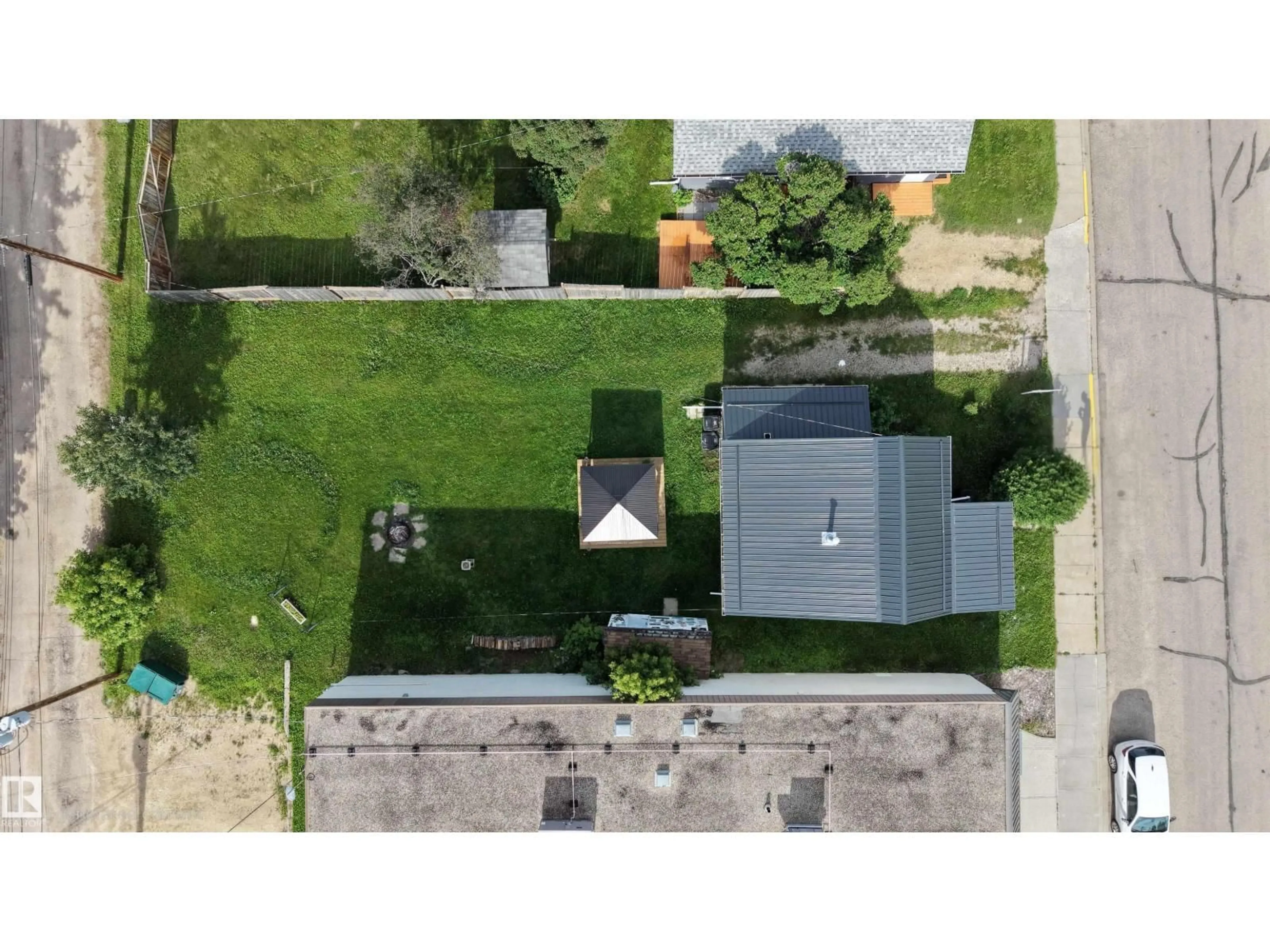 A pic from outside/outdoor area/front of a property/back of a property/a pic from drone, street for 4912 49 AV, Onoway Alberta T0E1V0