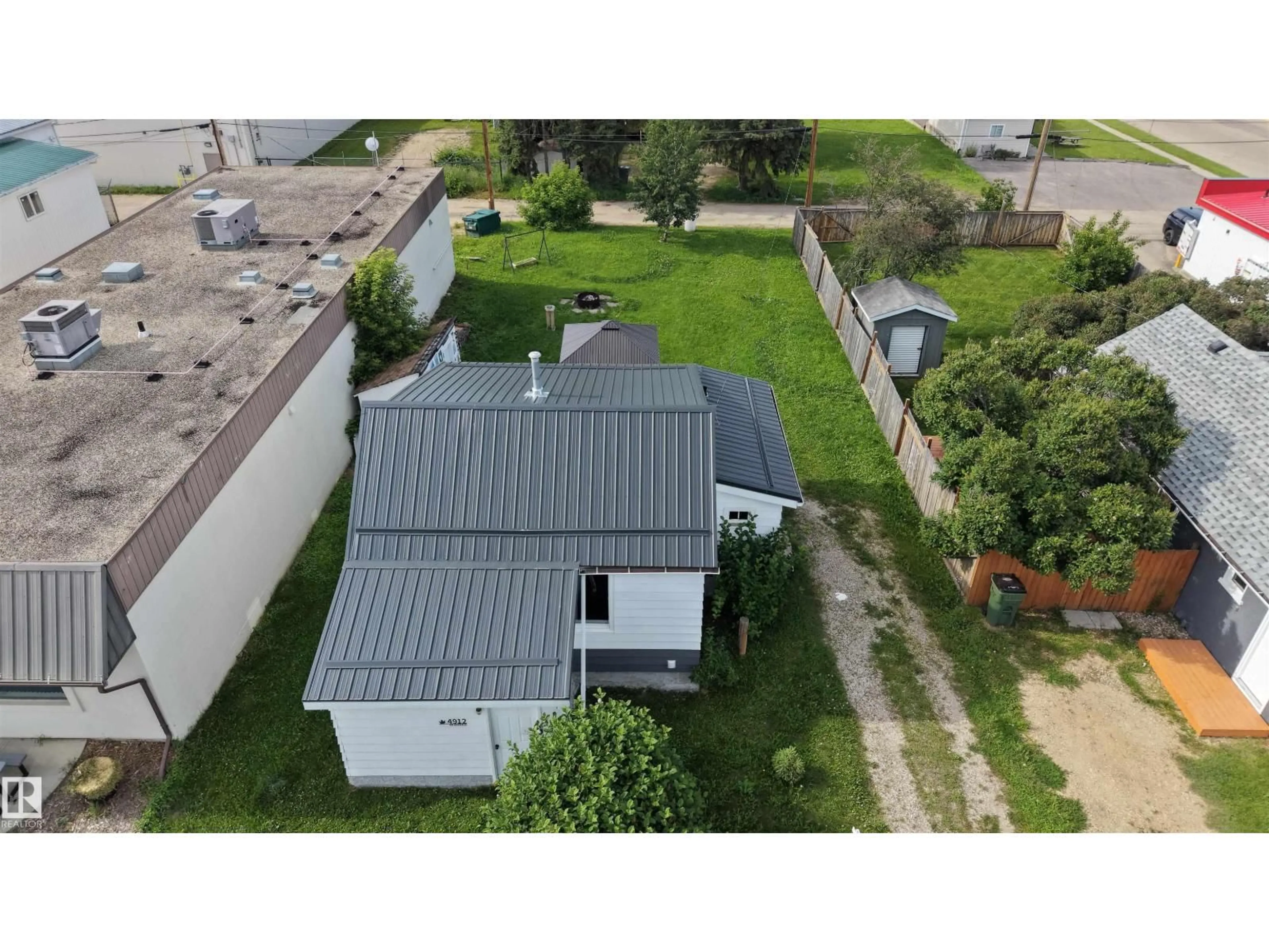 A pic from outside/outdoor area/front of a property/back of a property/a pic from drone, street for 4912 49 AV, Onoway Alberta T0E1V0