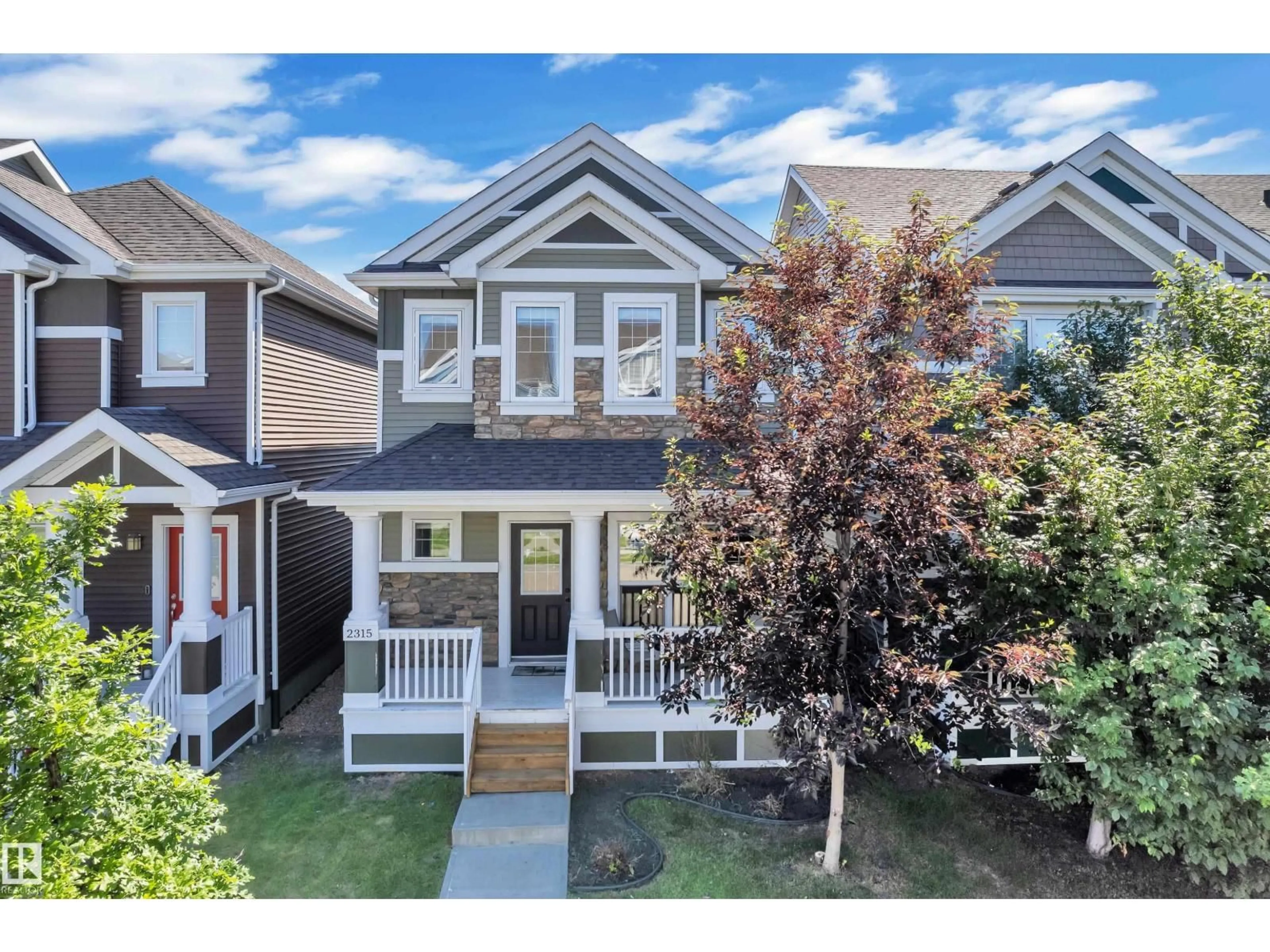 Home with vinyl exterior material, street for SW - 2315 70 ST, Edmonton Alberta T6X1Z2