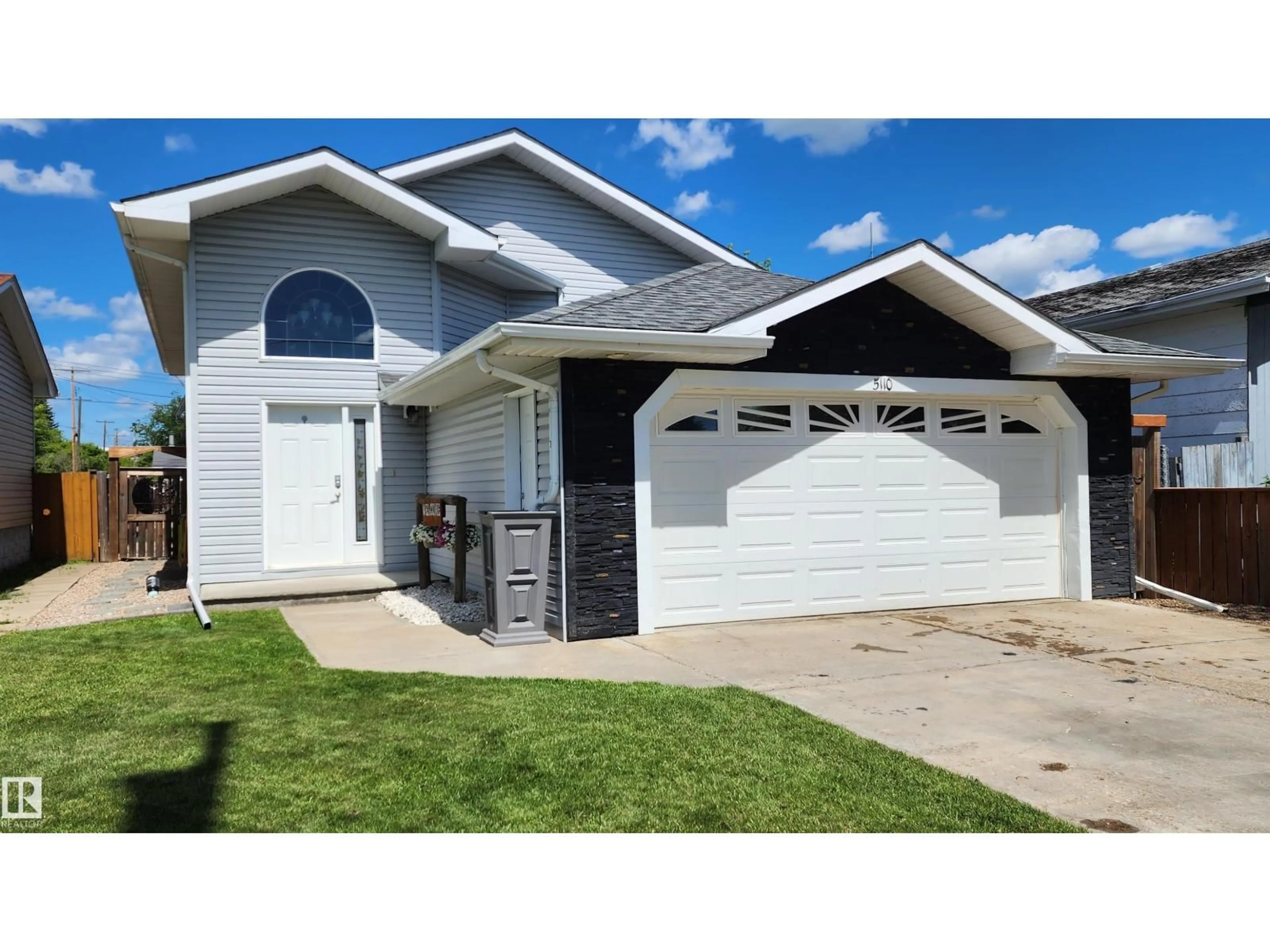 Home with vinyl exterior material, street for 5110 50 AV, Elk Point Alberta T0A1A0