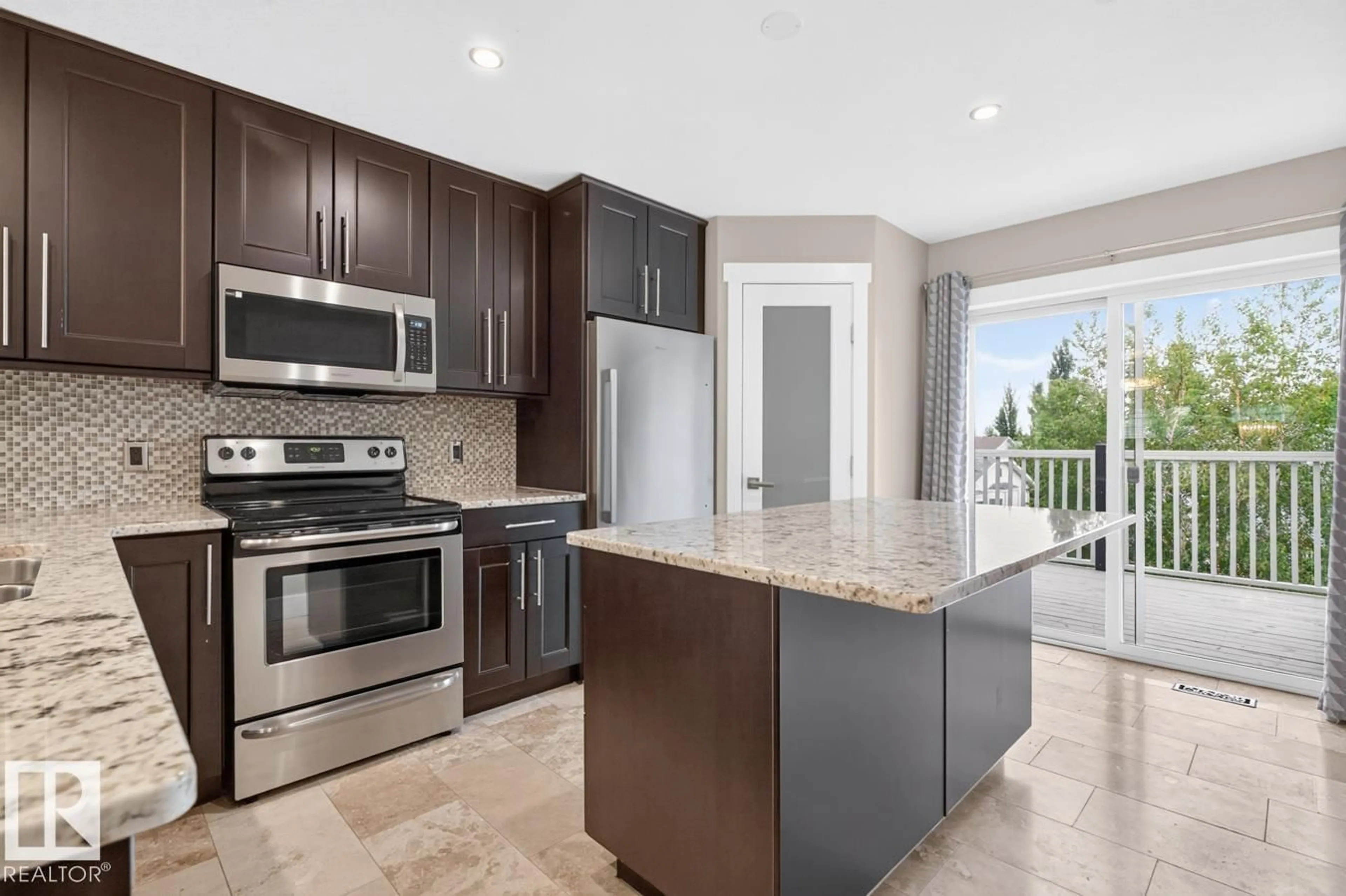 Open concept kitchen, ceramic/tile floor for 5612 55 ST, Beaumont Alberta T4X1L7