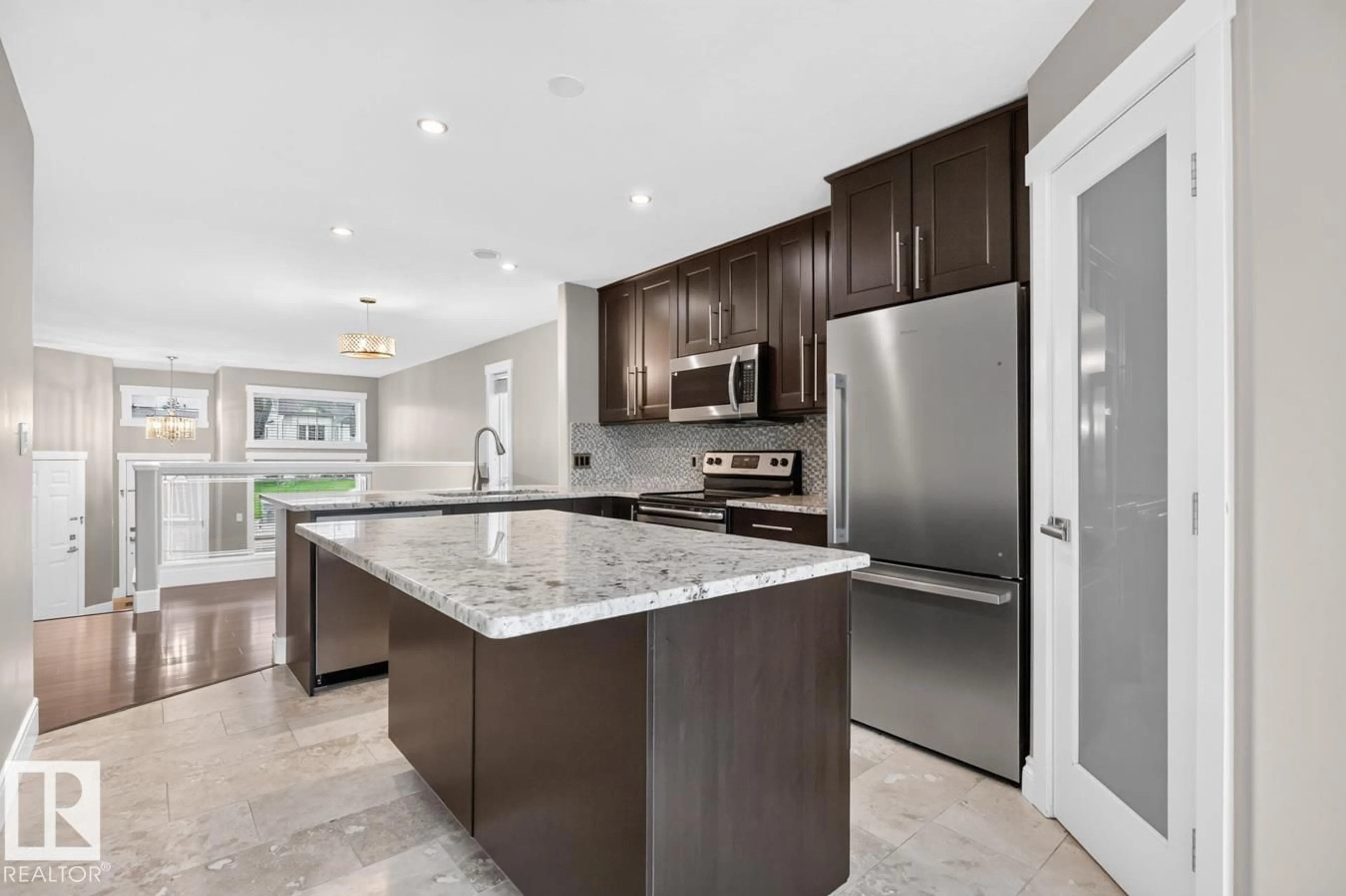 Open concept kitchen, ceramic/tile floor for 5612 55 ST, Beaumont Alberta T4X1L7