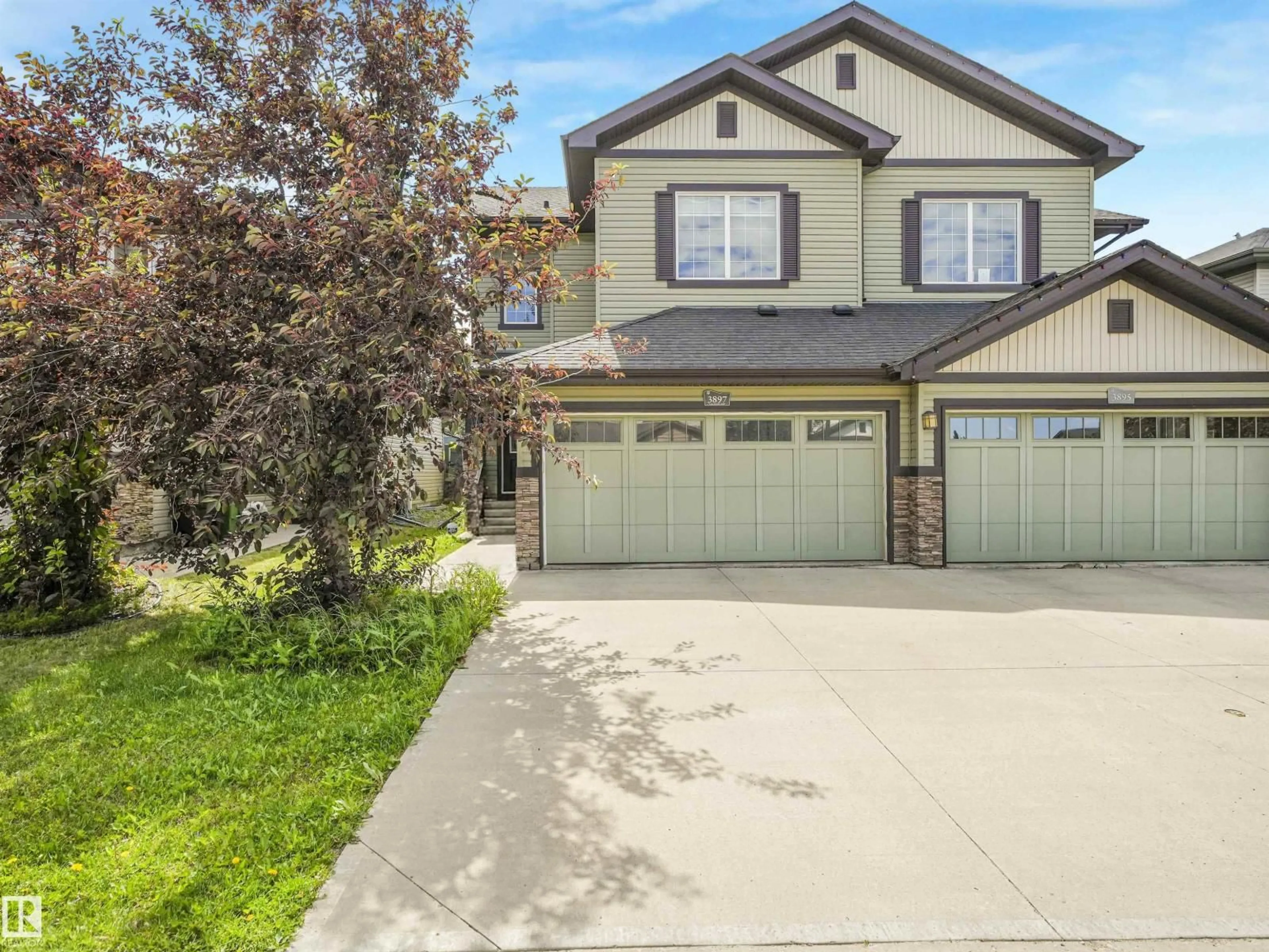 Home with vinyl exterior material, street for 3897 GALLINGER LO, Edmonton Alberta T5T4G6